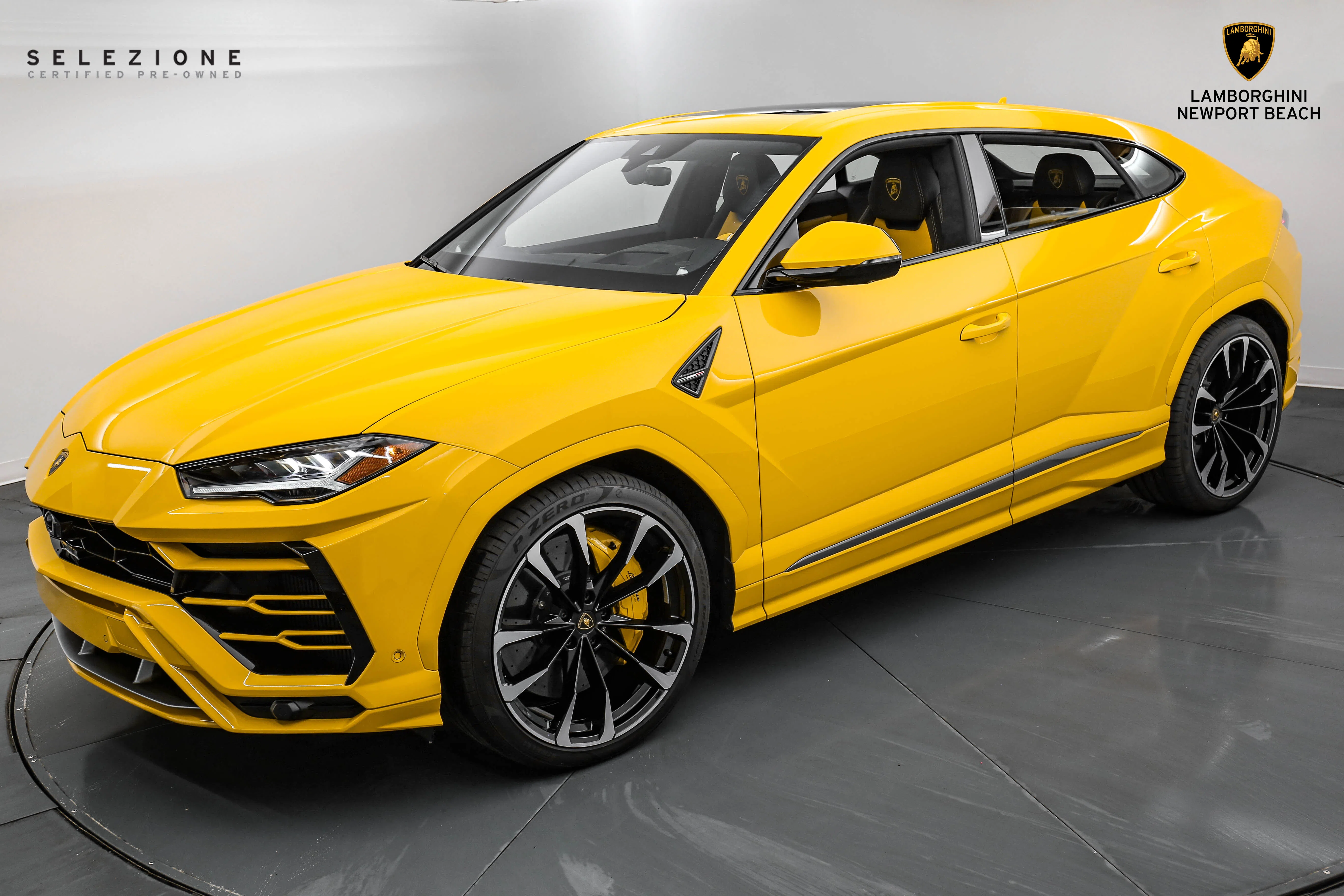 2022 Lamborghini Urus for sale, front three-quarter view, Giallo Auge