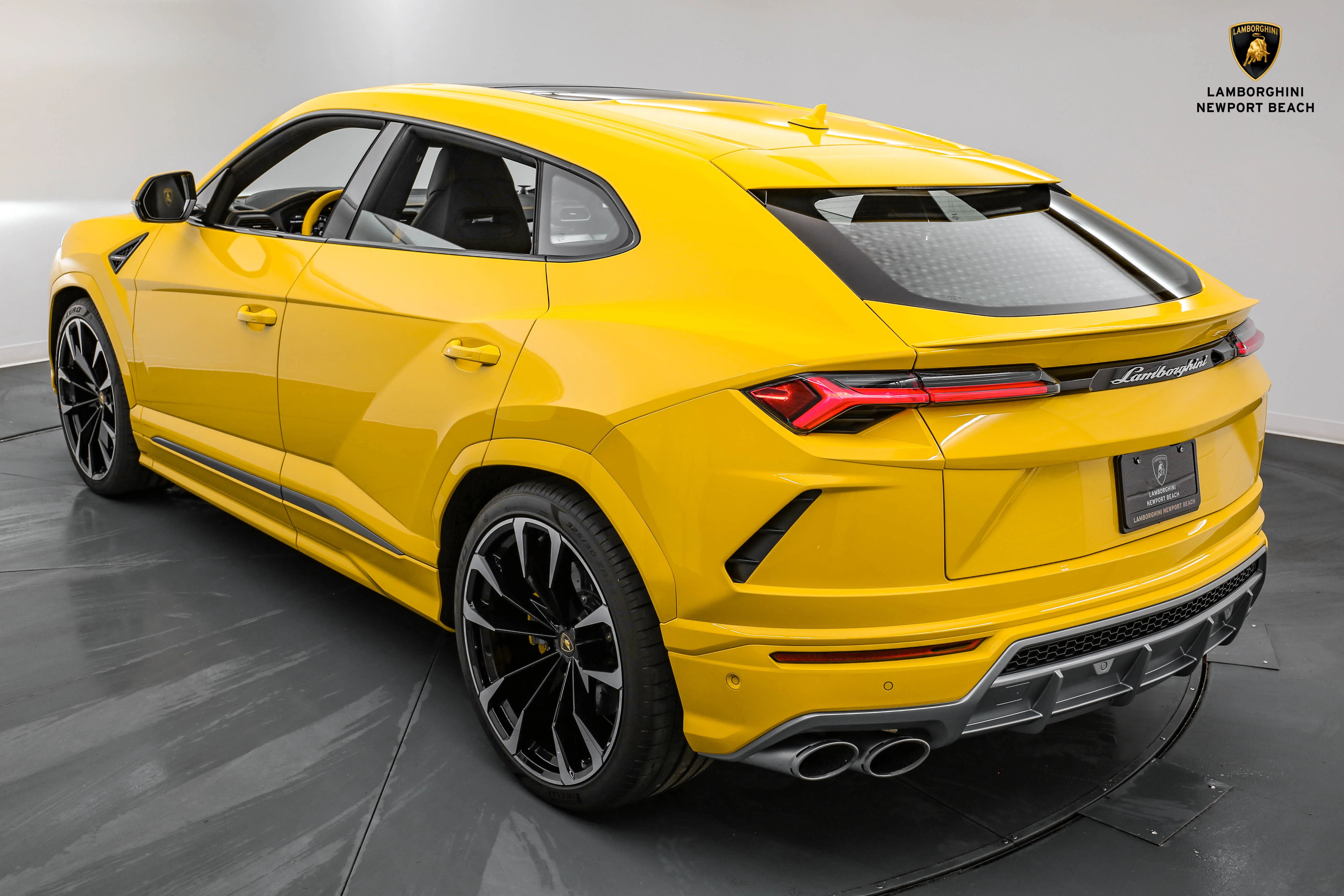 2022 Lamborghini Urus, rear three-quarter view, Giallo Auge