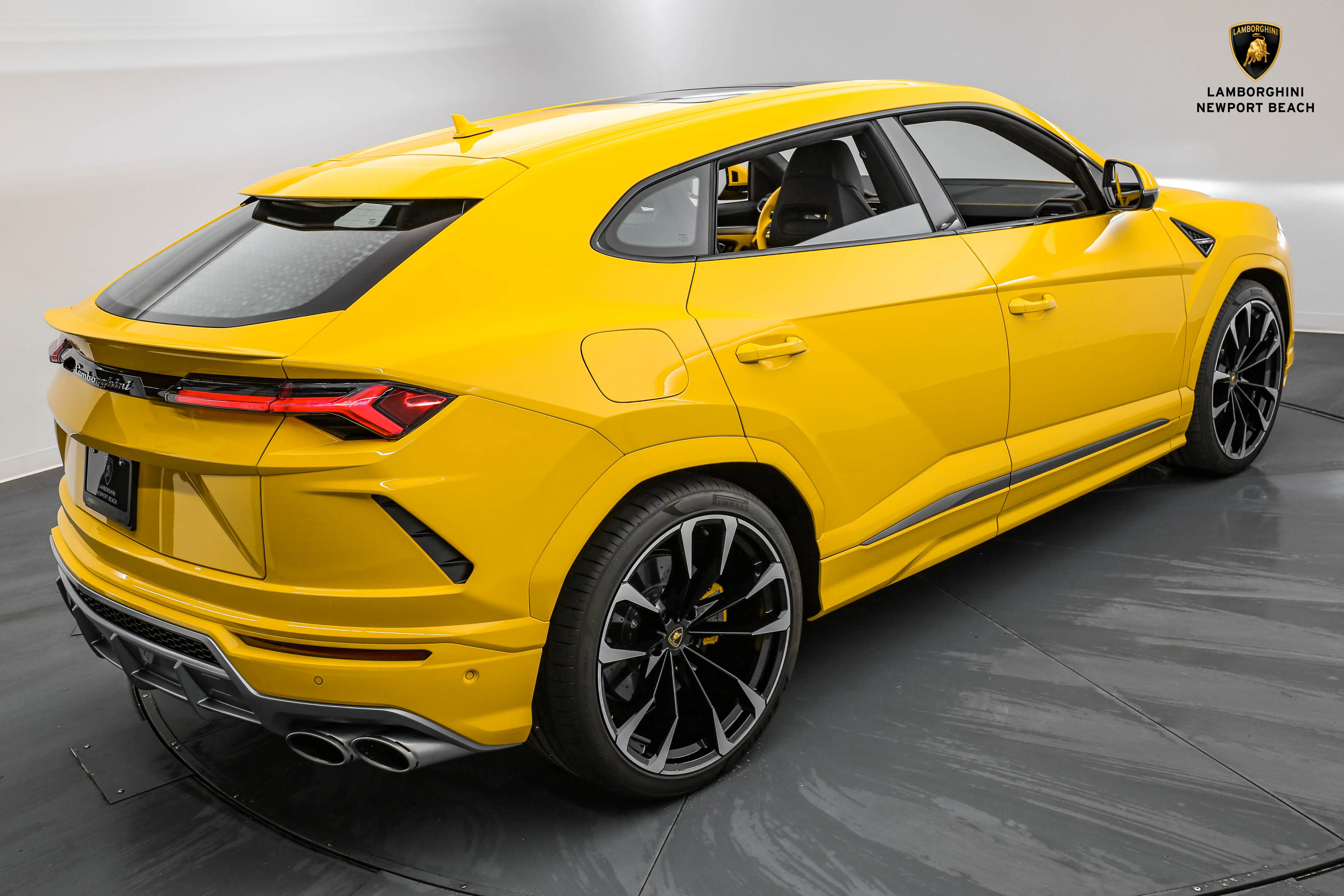 2022 Lamborghini Urus, rear three-quarter view, Giallo Auge