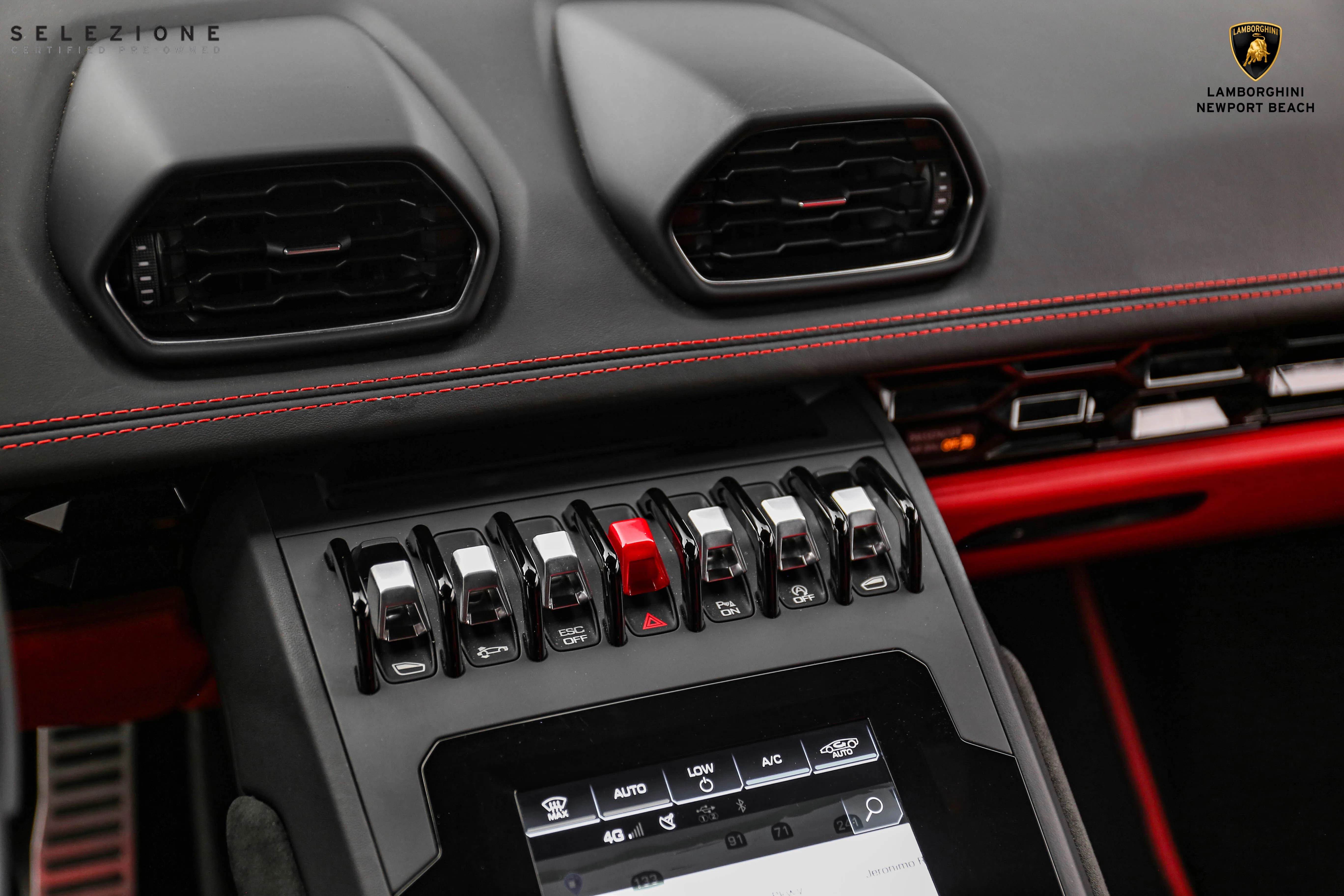 2020 Lamborghini Huracan EVO RWD interior, center console, Nero Ade/Rosso Alala