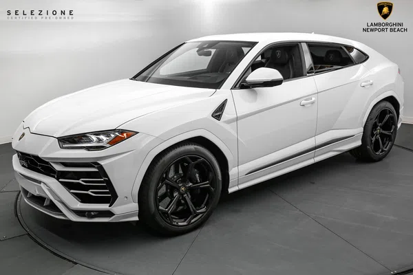 2021 Lamborghini Urus for sale, front three-quarter view, Bianco Monocerus