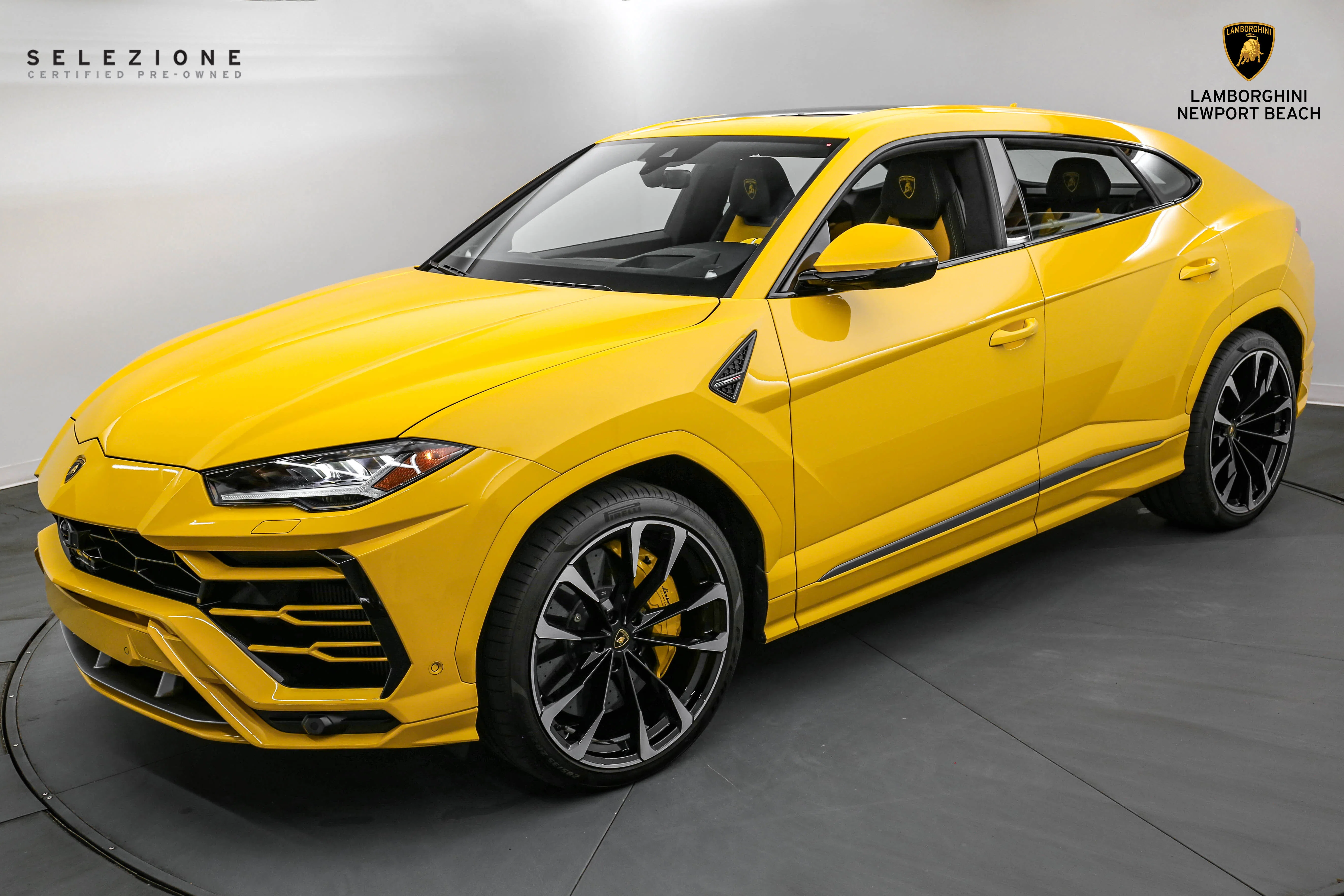 2022 Lamborghini Urus for sale, front three-quarter view, Giallo Auge