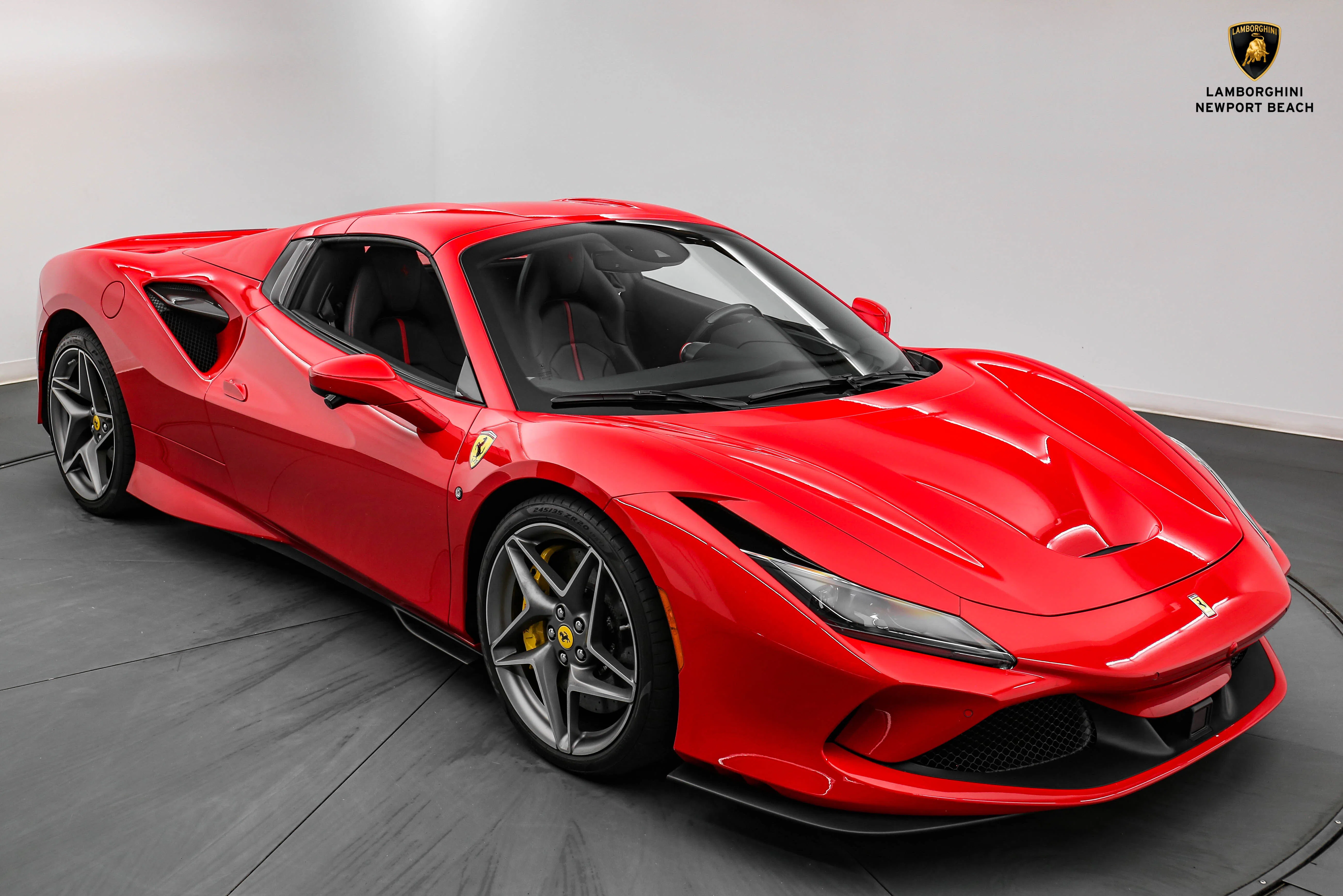 2021 Ferrari F8 Spider for sale, front three-quarter view, Rosso Corsa