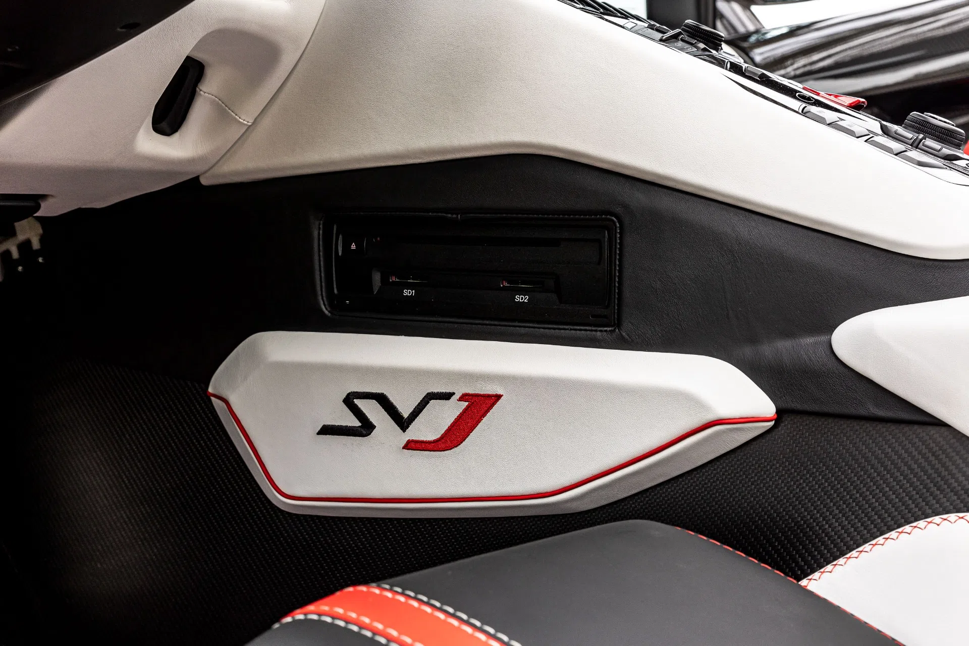 2021 Lamborghini Aventador interior, center console, Nero Cosmus with Rosso Alala