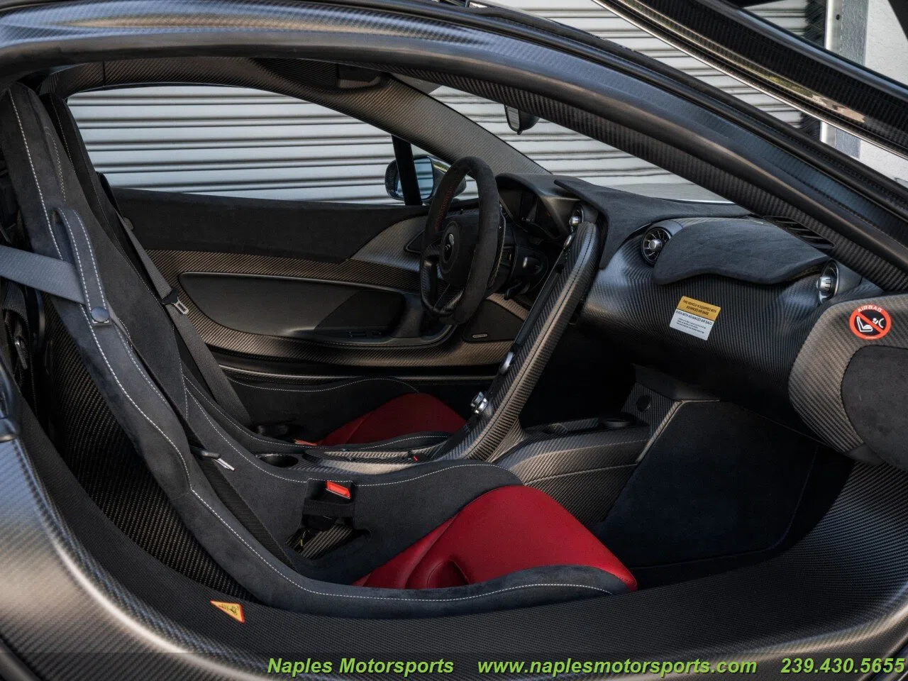 2015 McLaren P1 interior, Carbon Black with Red Insert