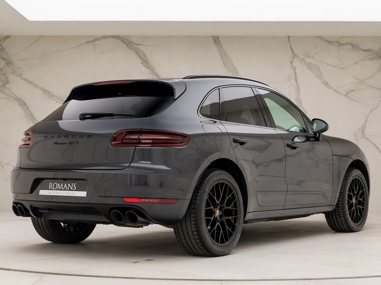 2018 Porsche Macan GTS, rear three-quarter view, Volcano Grey