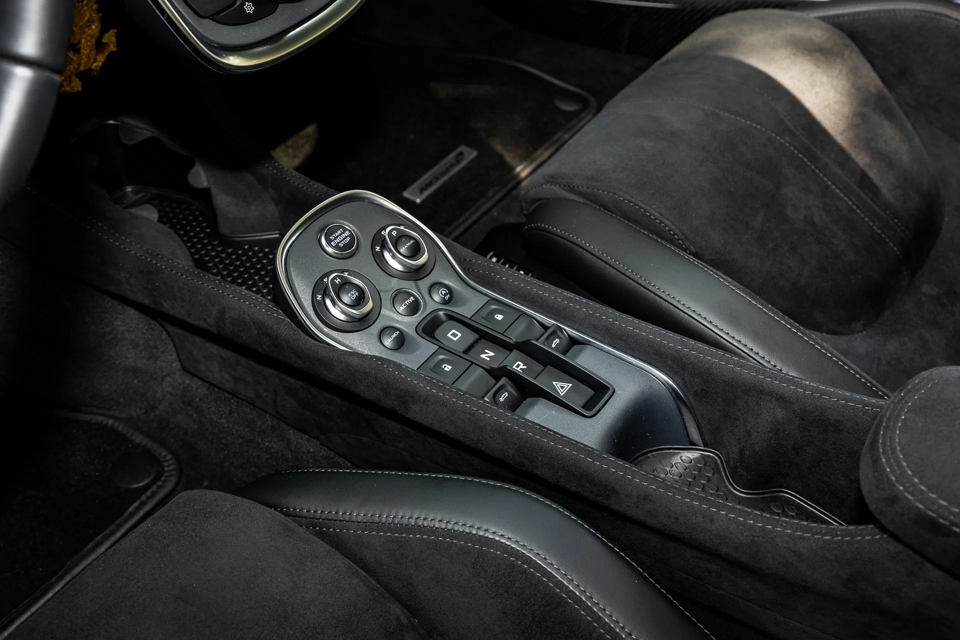 2019 McLaren 570GT interior, center console, Carbon Black