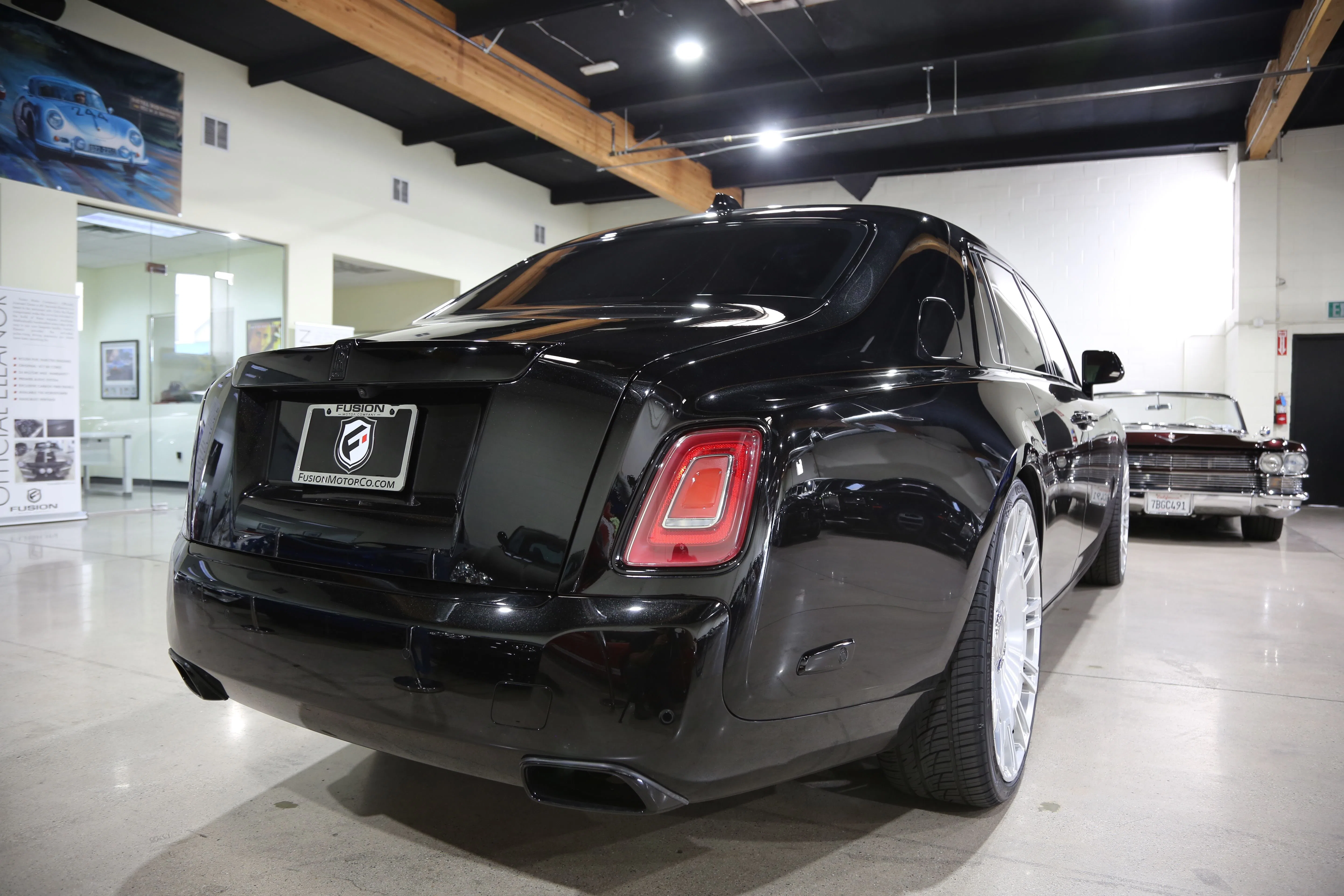2022 Rolls-Royce Phantom, rear three-quarter view, Black Diamond