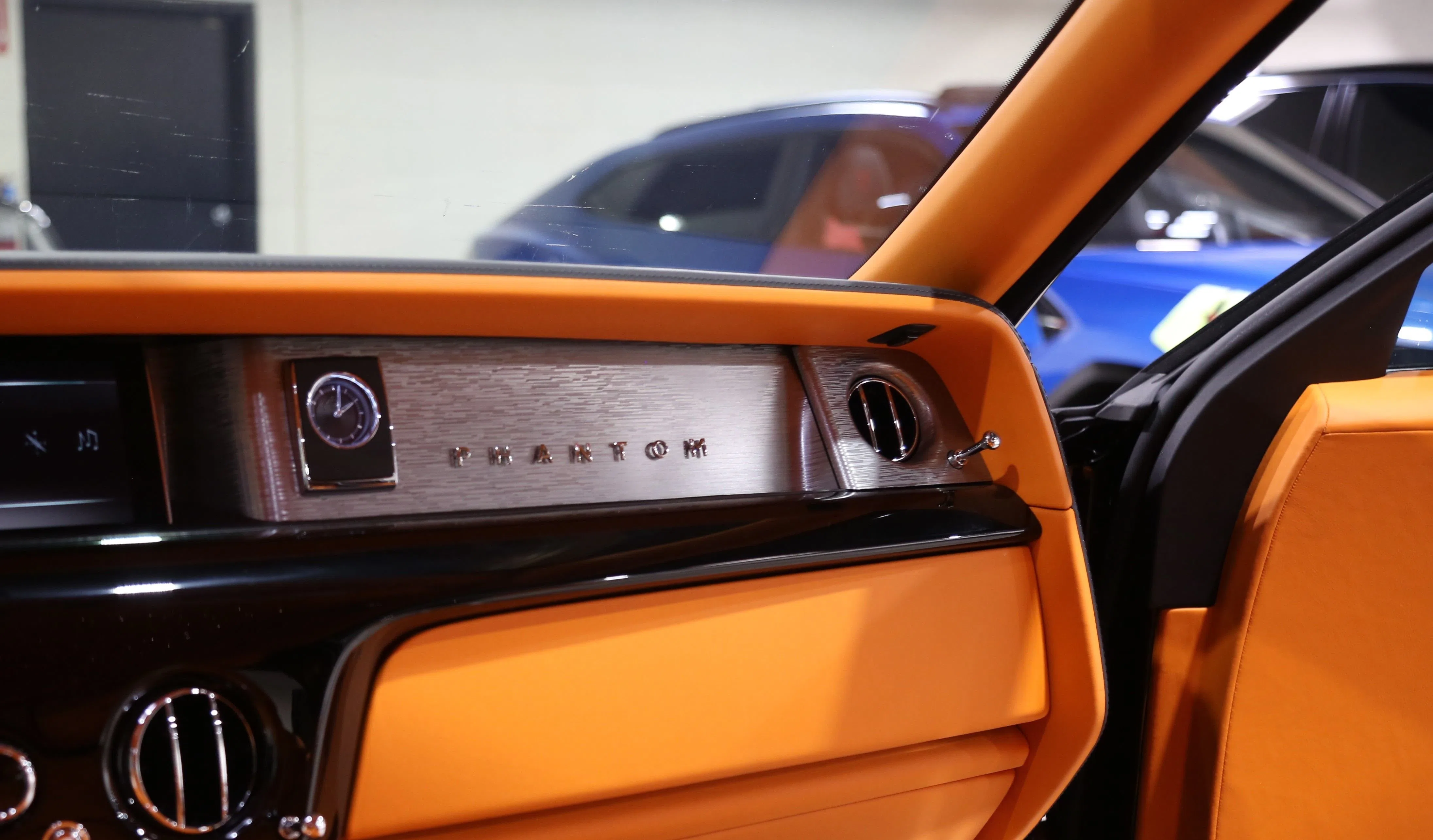 2022 Rolls-Royce Phantom interior, door panel, Mandarin Orange