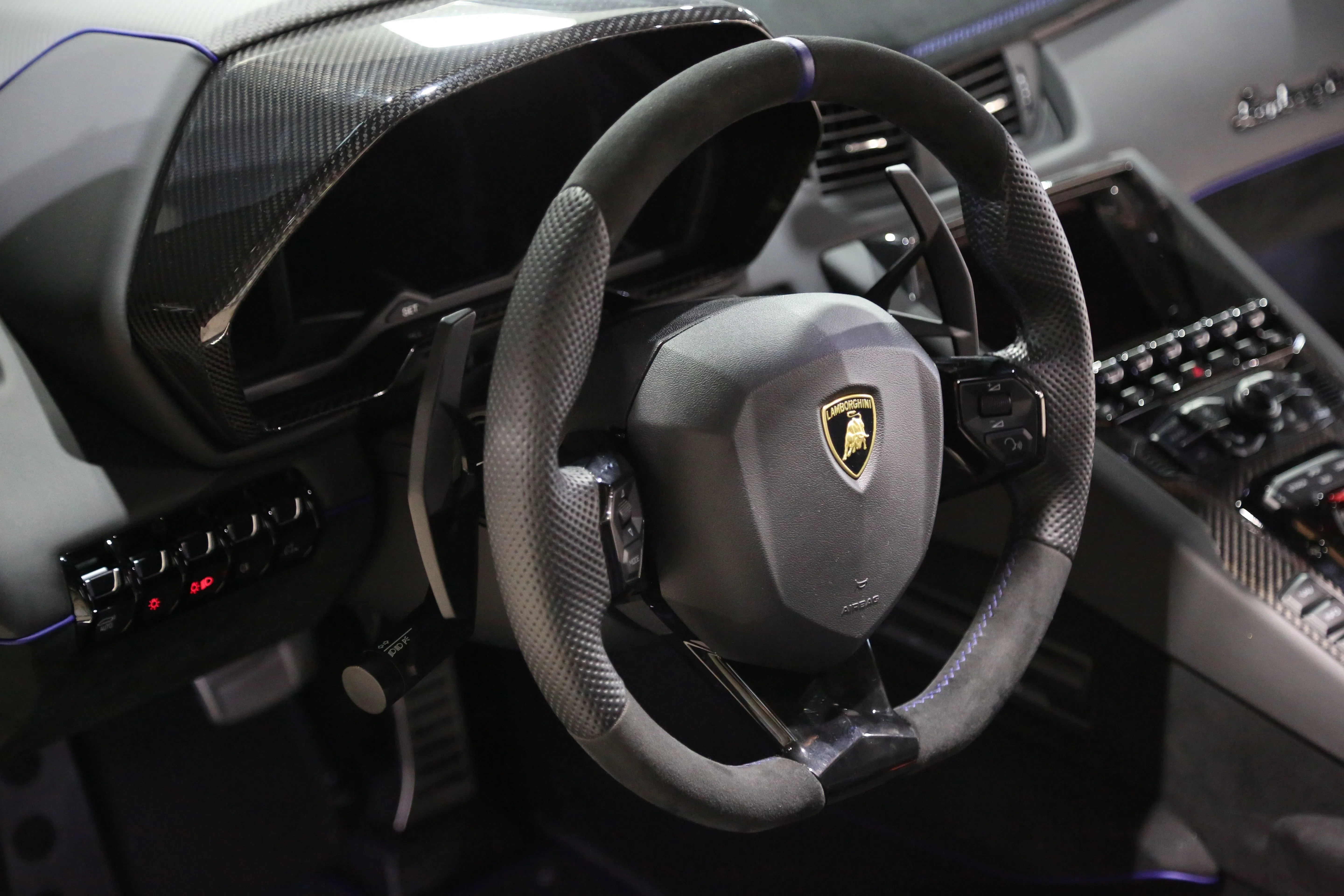 2020 Lamborghini Aventador SVJ Roadster interior, steering wheel, Black with deviated stitching and trim