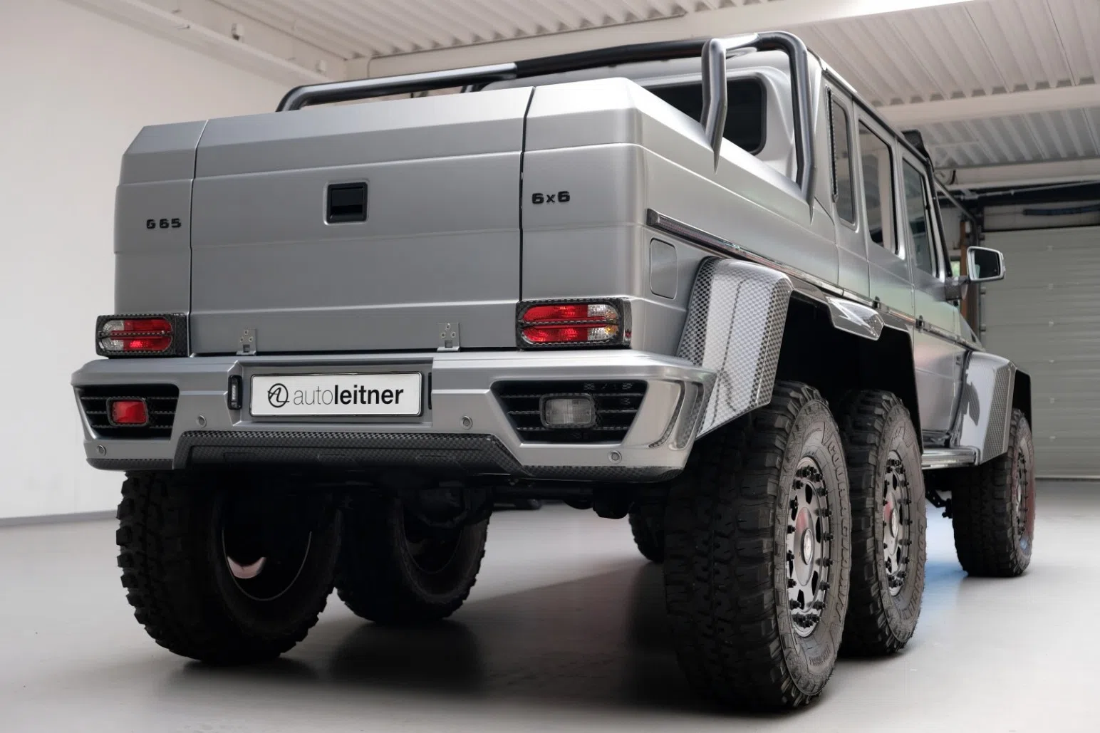 2013 Mansory G-Class Gronos 6x6, rear three-quarter view