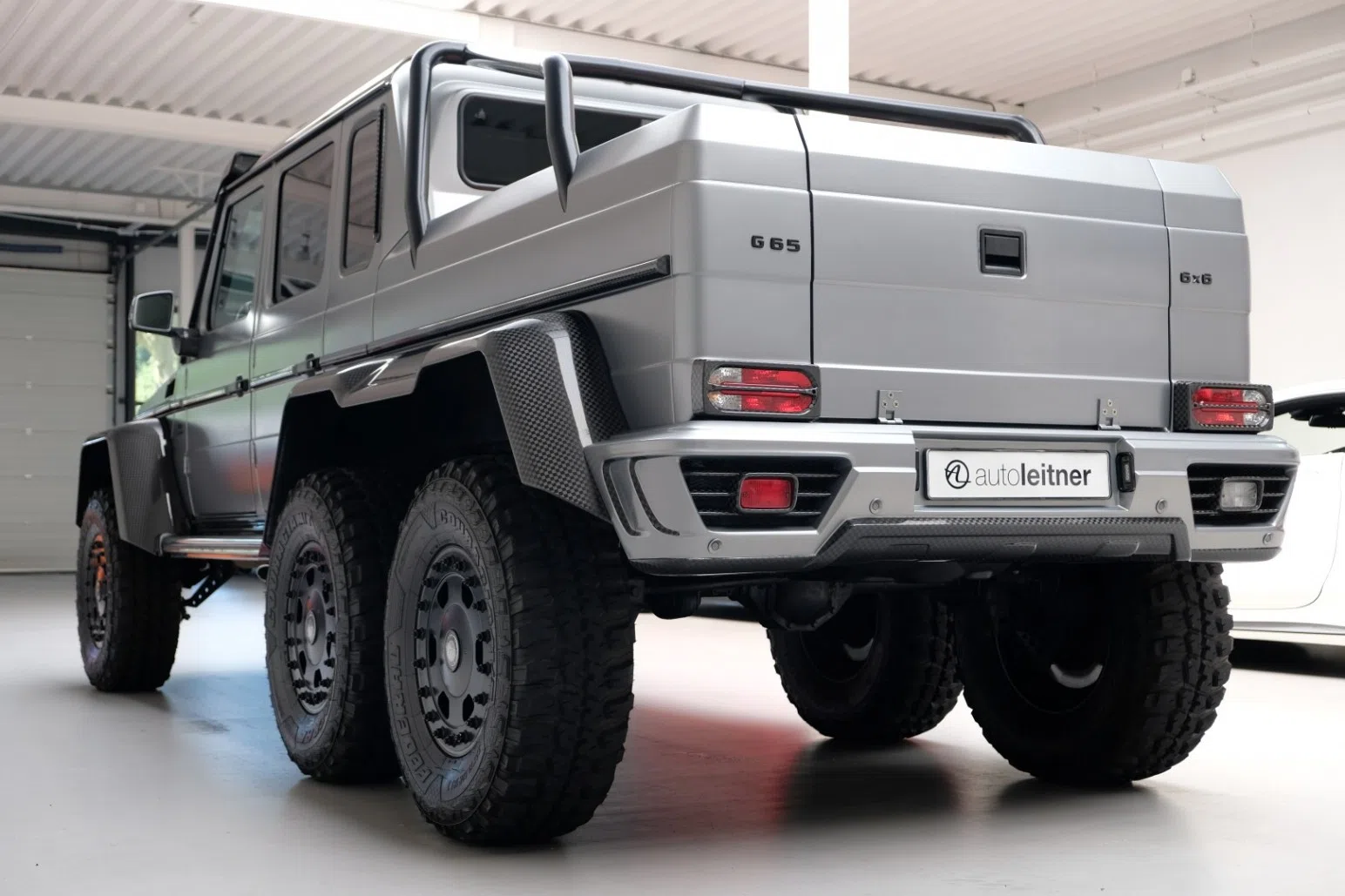 2013 Mansory G-Class Gronos 6x6, rear three-quarter view