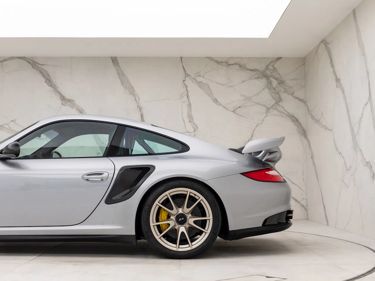 2011 Porsche 911 (997) GT2 RS, side profile, GT Silver