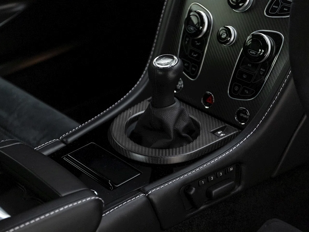 2017 Aston Martin Vantage GT8 interior, center console, Pure Black Alcantara