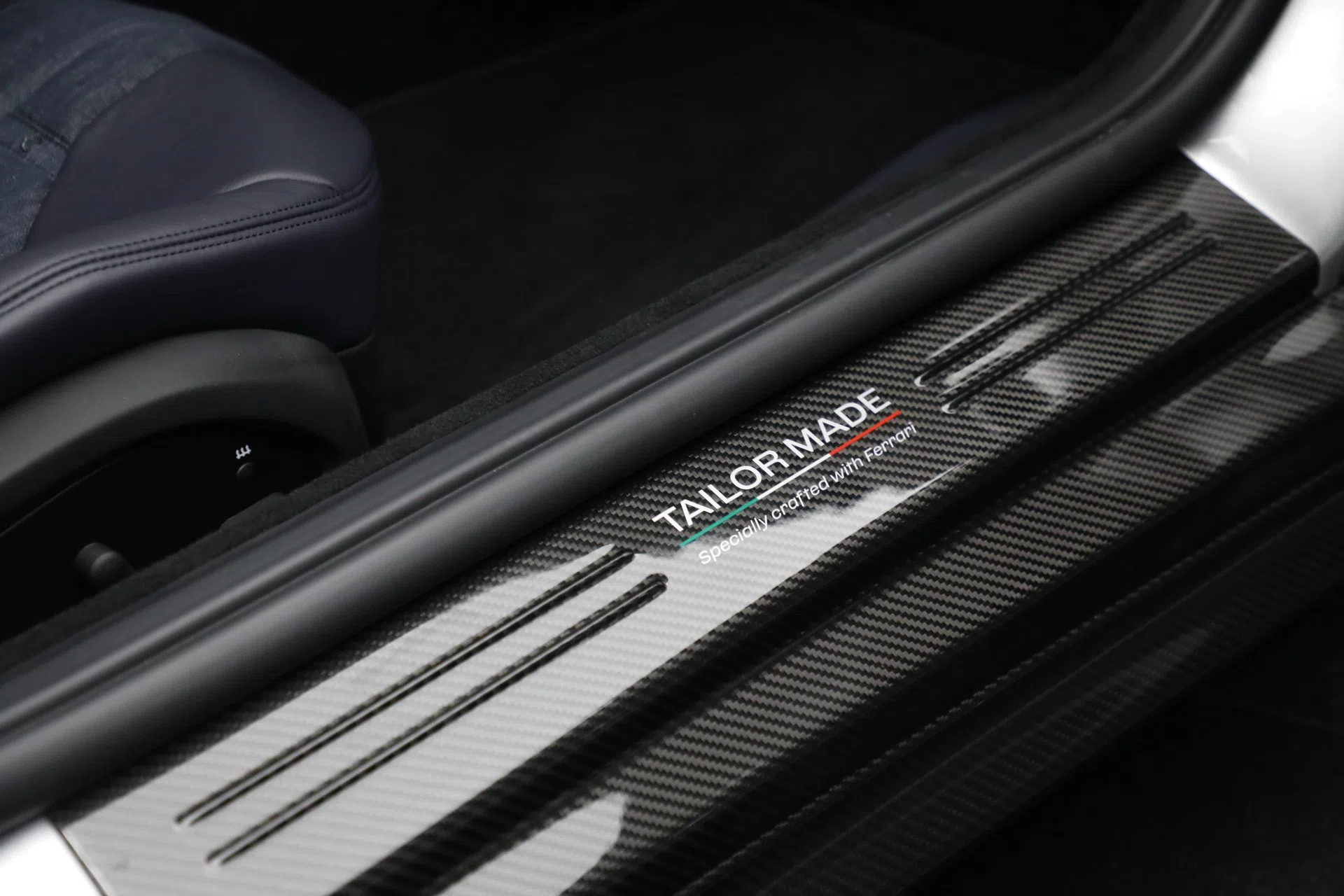 2022 Ferrari 812 GTS interior, door sill, Sanu Silver
