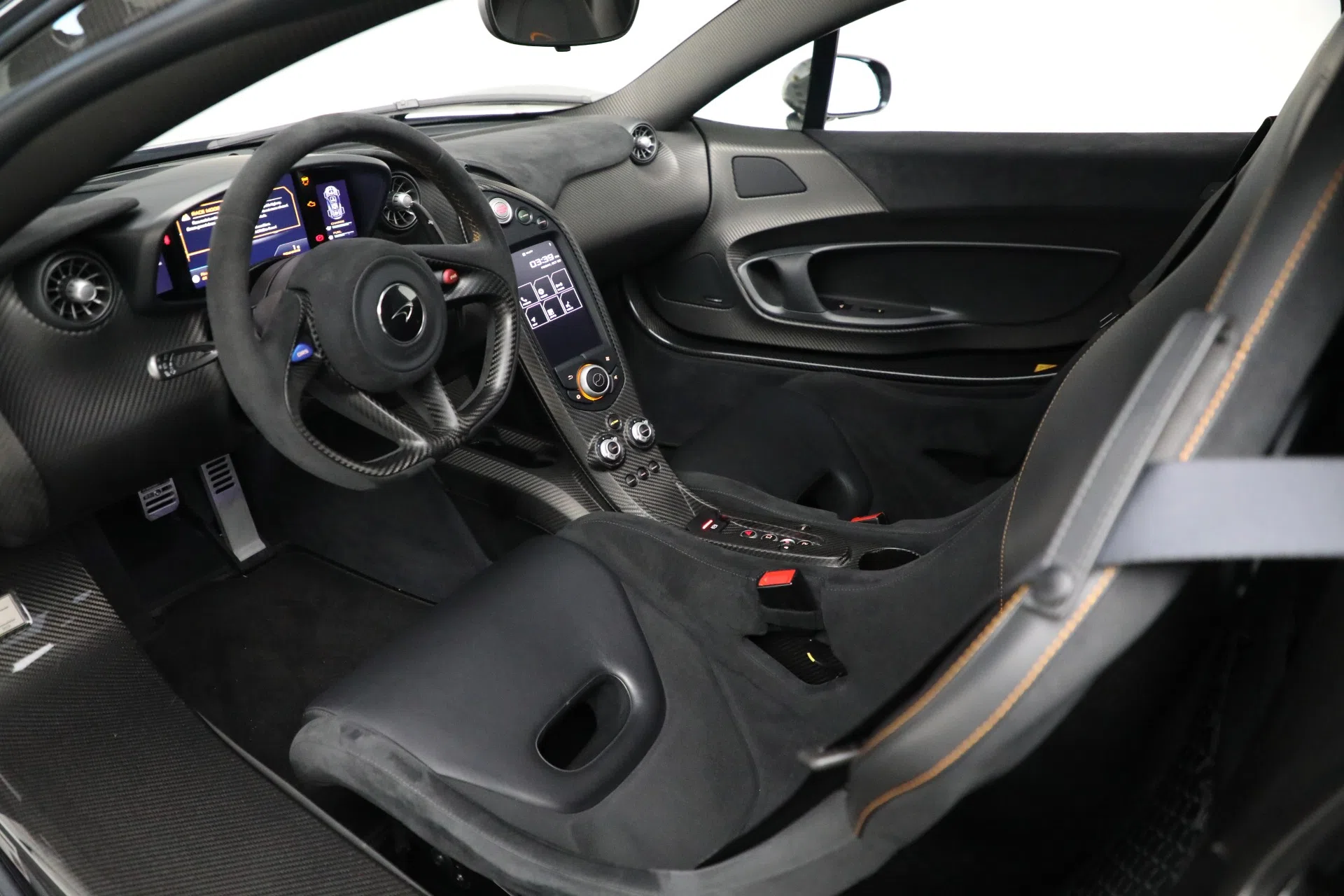 2015 McLaren P1 interior, Carbon Black with Orange Stitching