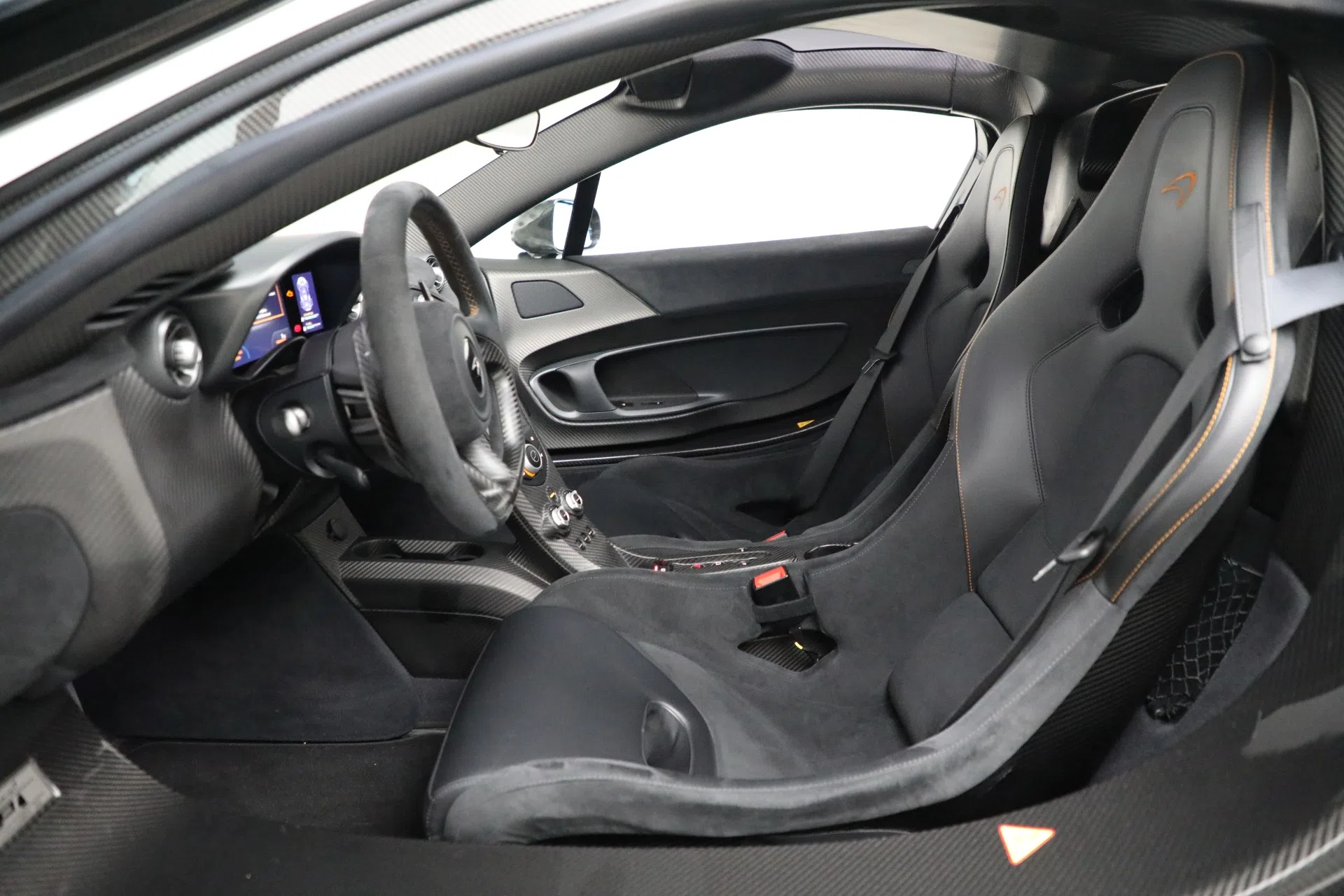 2015 McLaren P1 interior, Carbon Black with Orange Stitching