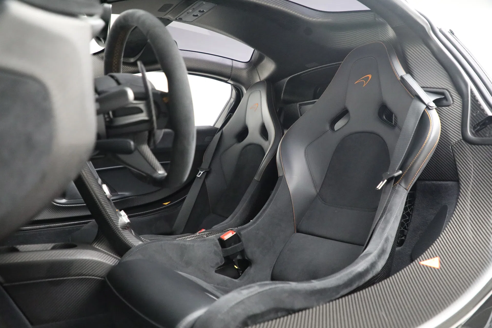 2015 McLaren P1 interior, Carbon Black with Orange Stitching