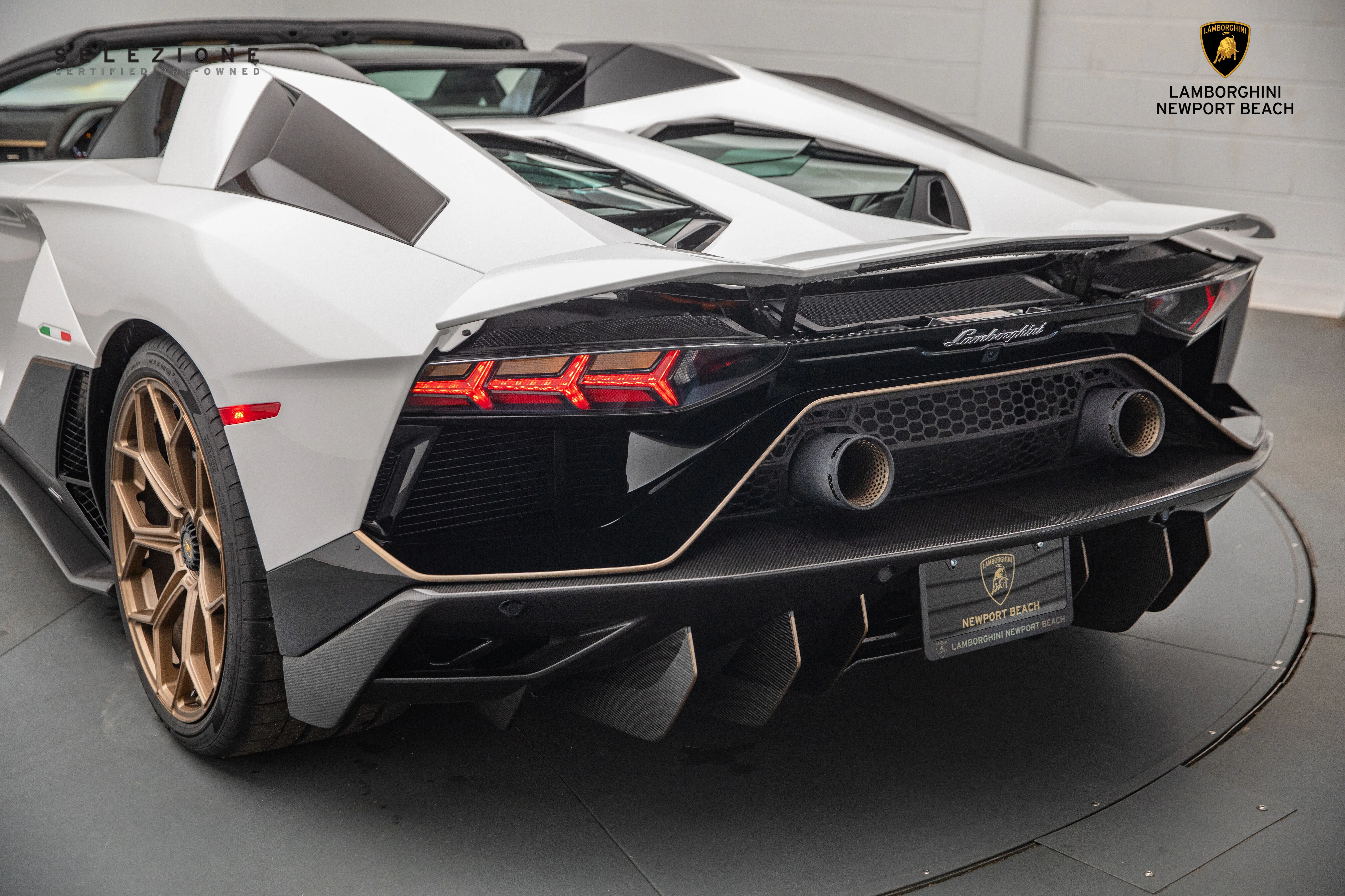 2022 Lamborghini Aventador LP 780-4 Ultimae Roadster, rear three-quarter view, Bianco Monocerus Metallic