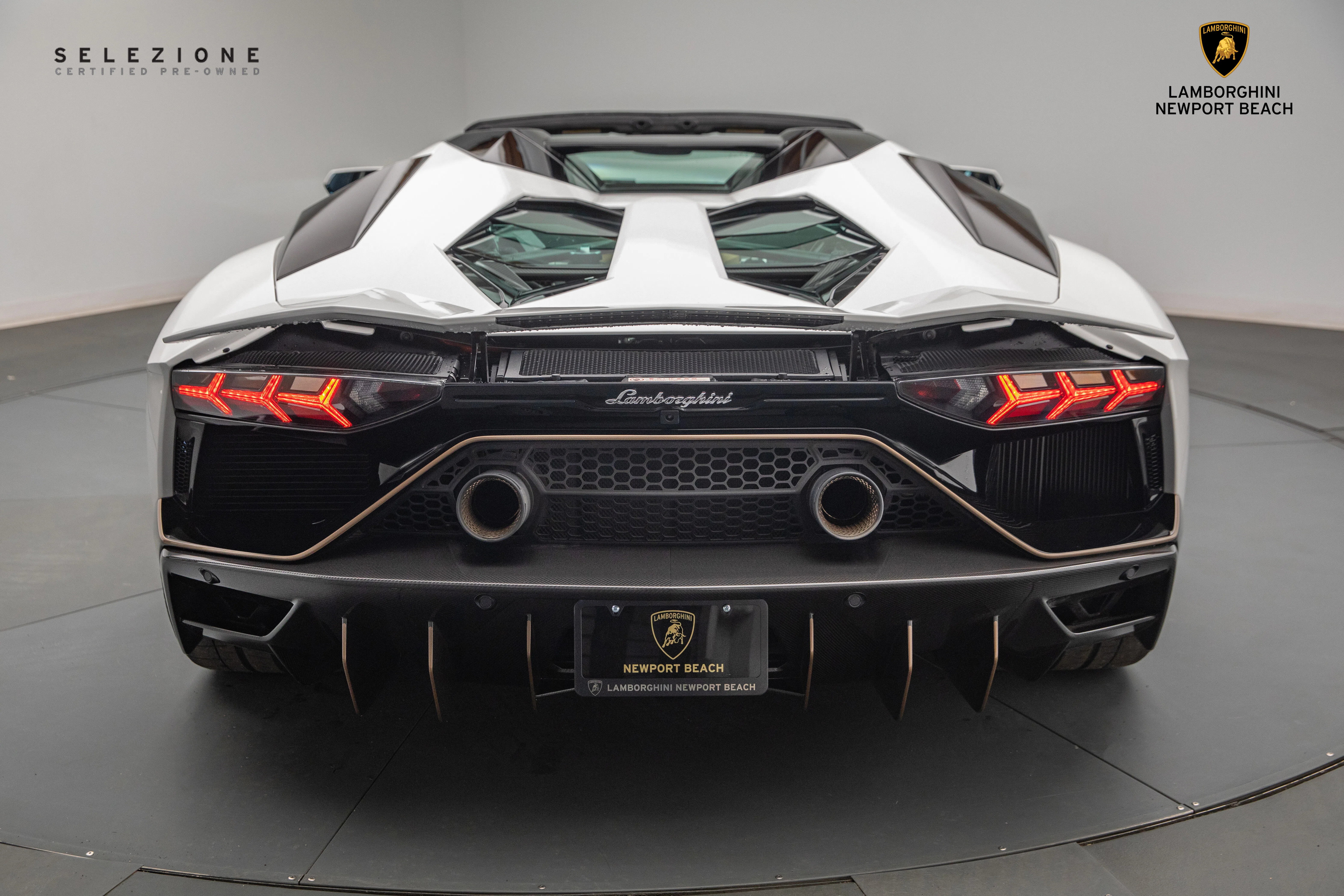 2022 Lamborghini Aventador LP 780-4 Ultimae Roadster, rear three-quarter view, Bianco Monocerus Metallic