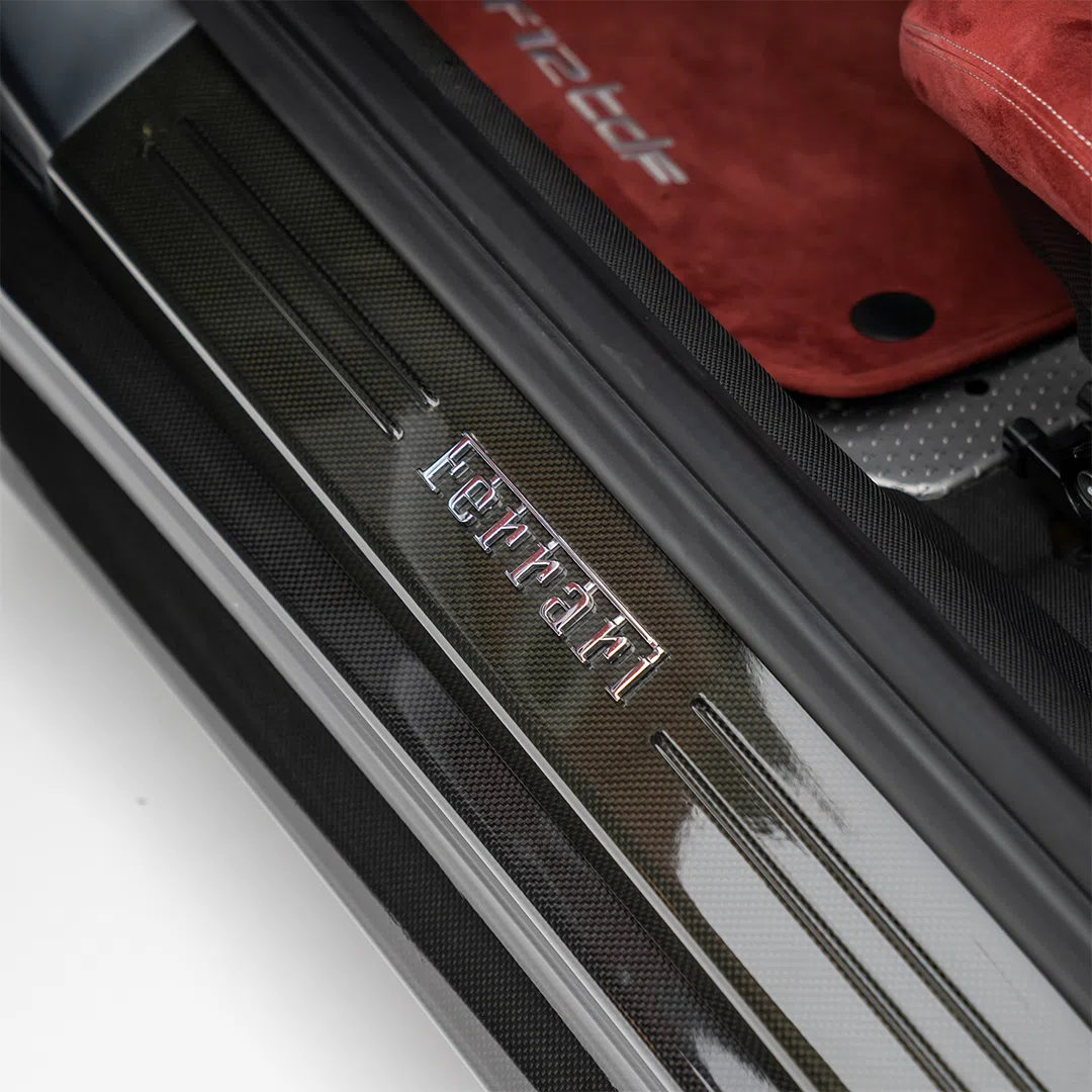 2016 Ferrari F12tdf interior, door sill