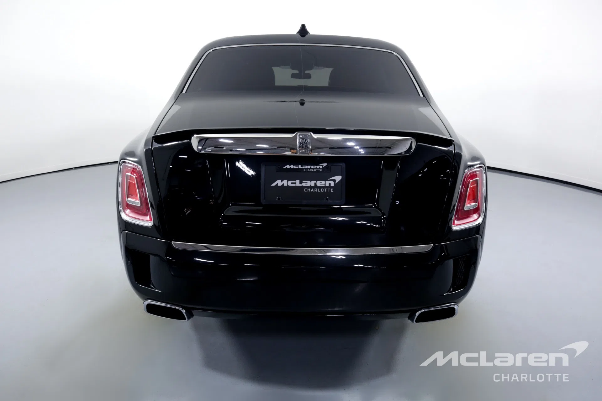 2021 Rolls-Royce Phantom, rear three-quarter view, Black Diamond