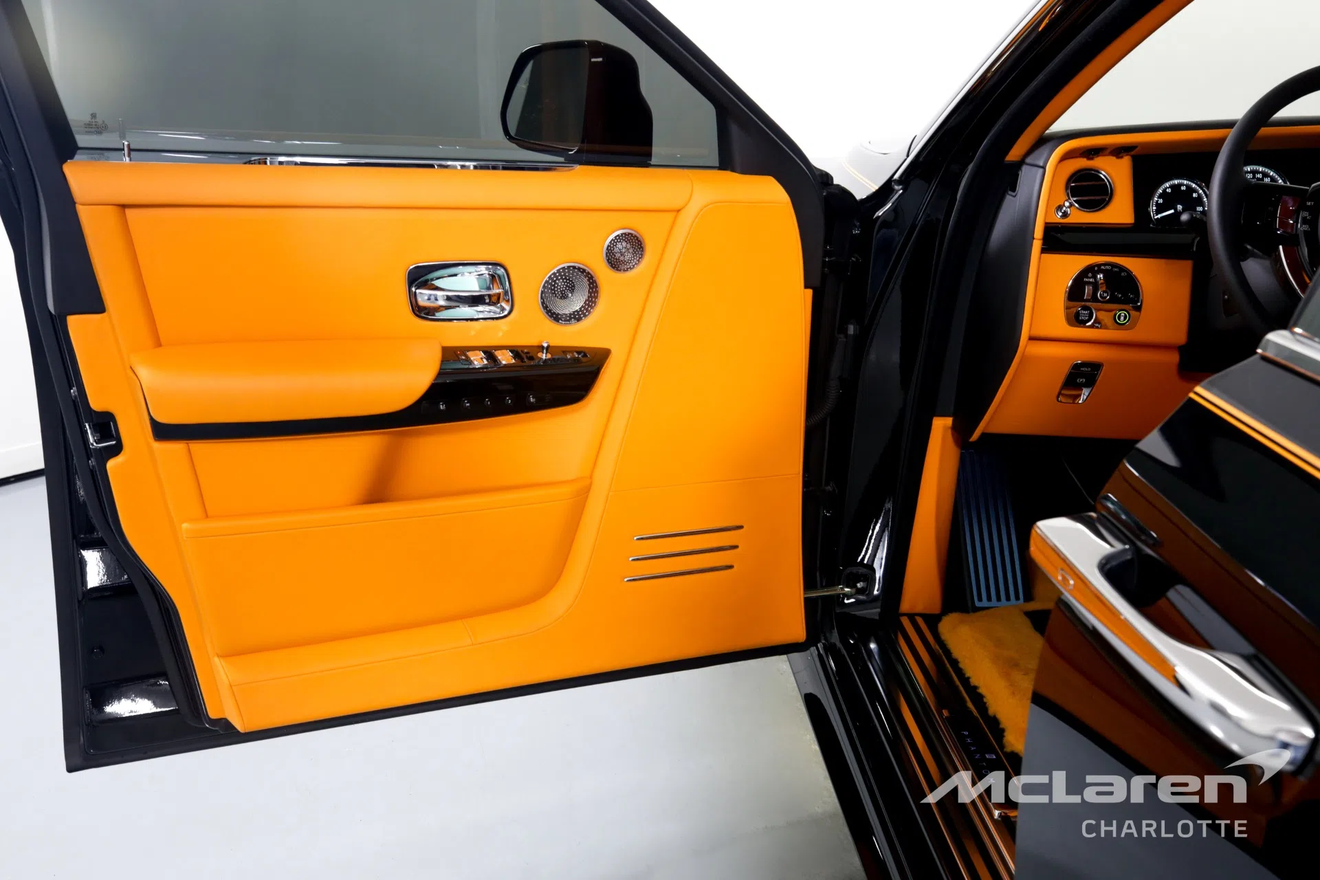 2021 Rolls-Royce Phantom interior, door panel, Mandarin/Black