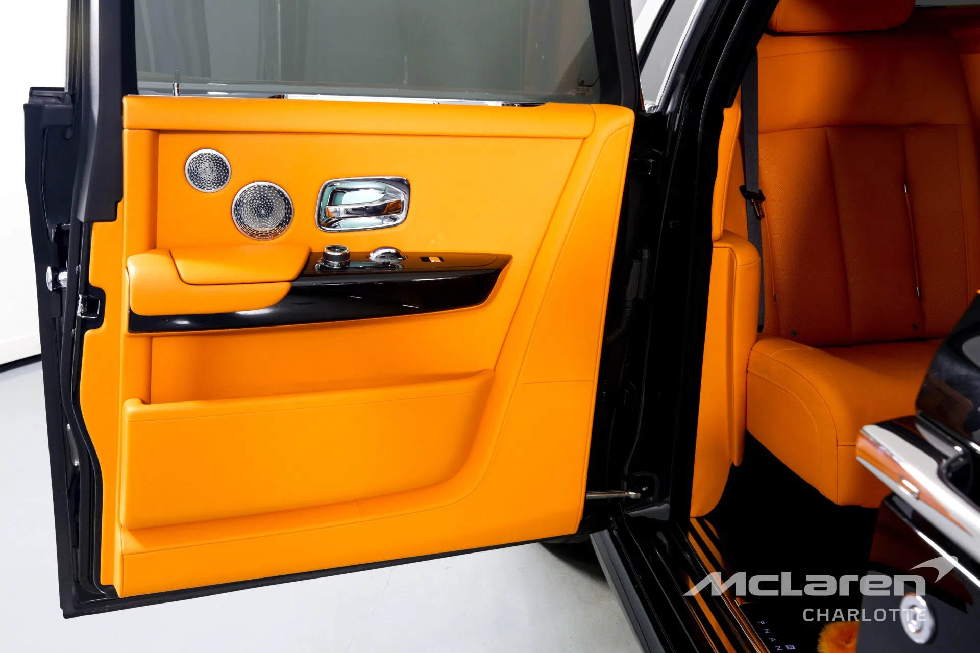 2021 Rolls-Royce Phantom interior, door panel, Mandarin/Black