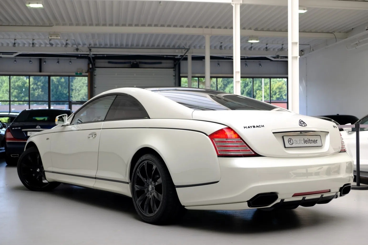 2010 Maybach 57S Coupe Xenatec, rear three-quarter view