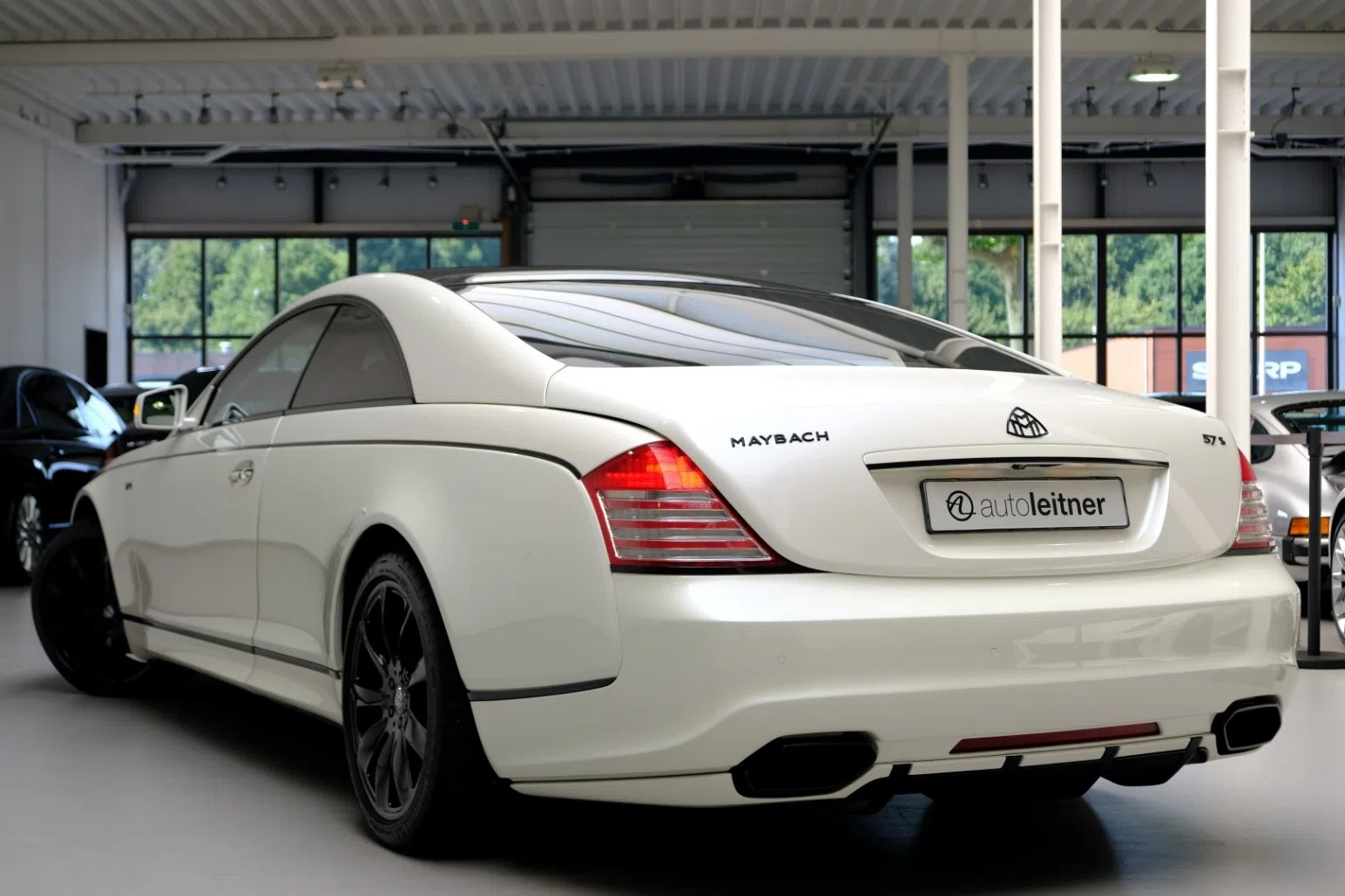 2010 Maybach 57S Coupe Xenatec, rear three-quarter view
