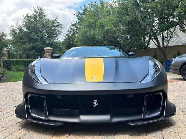 2022 Ferrari 812 Competizione for sale, exterior, Matte Black w/ Yellow