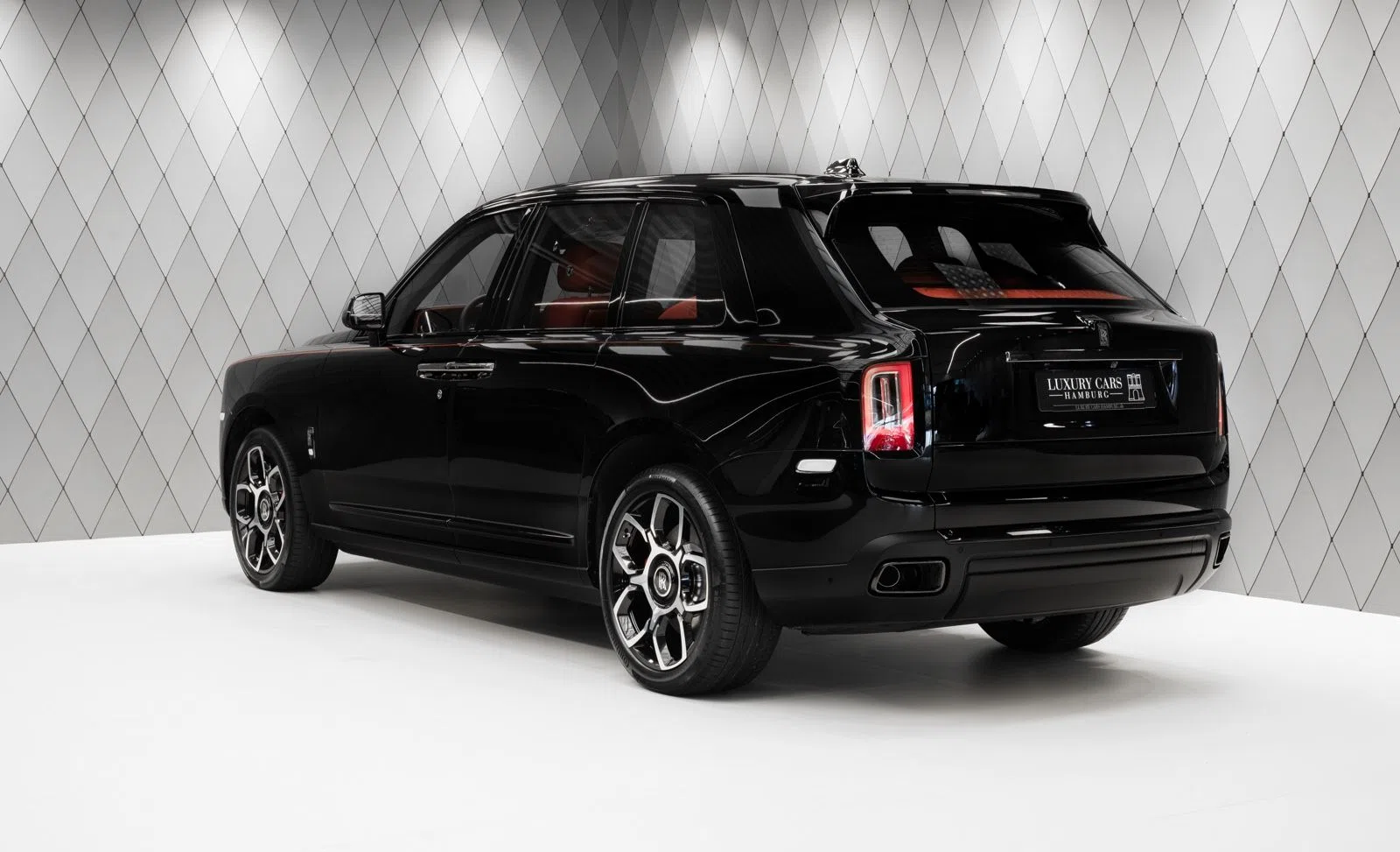 2023 Rolls-Royce Cullinan Black Badge, rear three-quarter view, Diamond Black