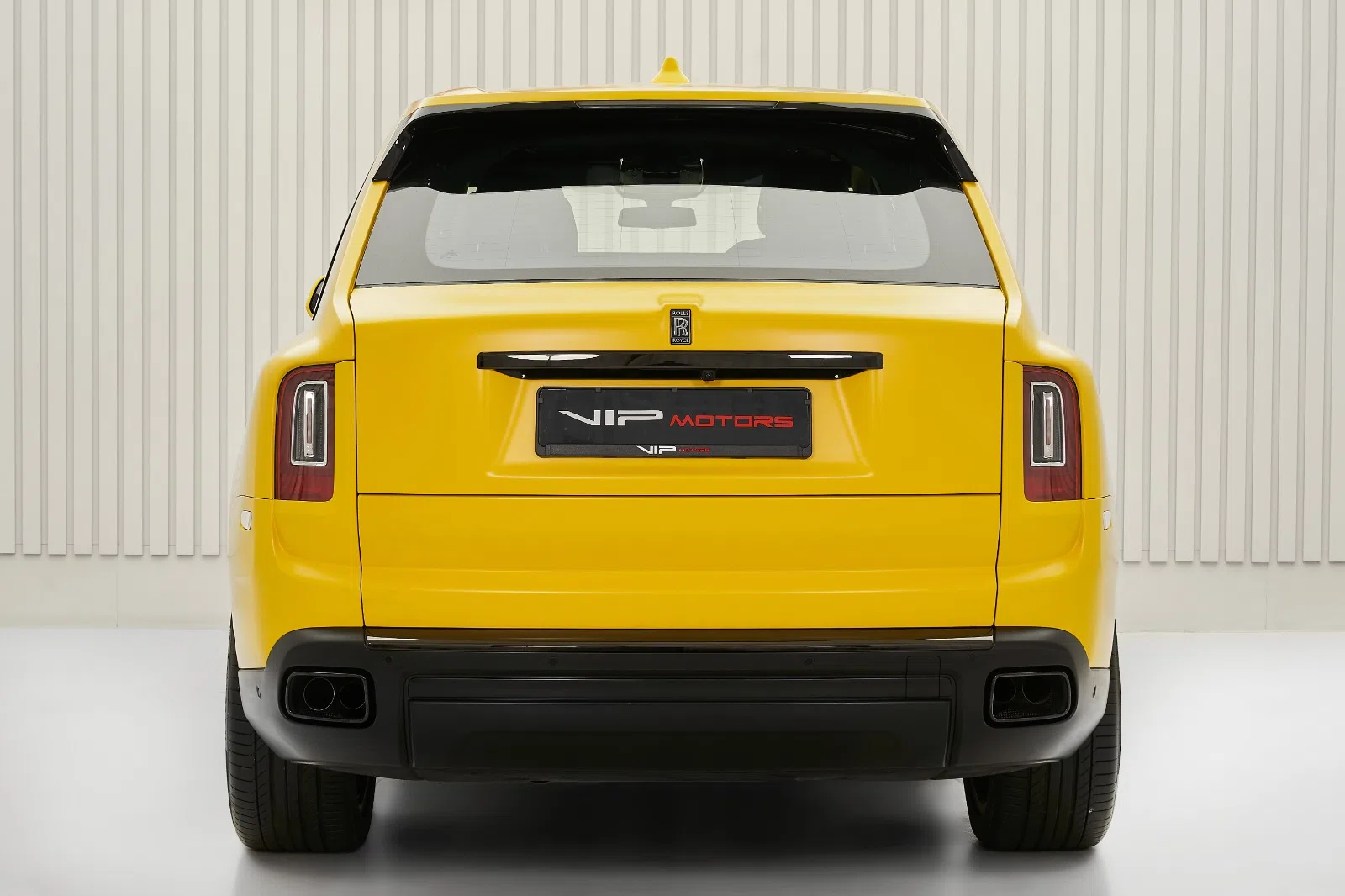 2022 Rolls-Royce Cullinan Black Badge, rear three-quarter view, Yellow