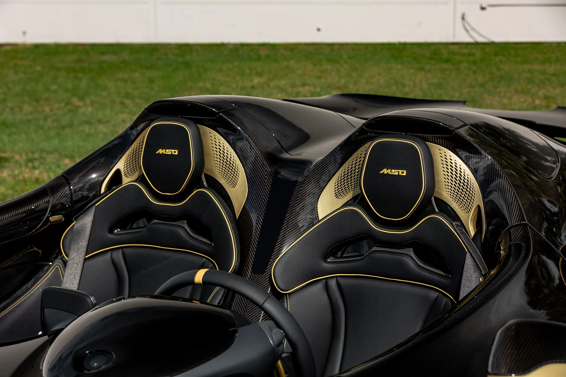 2021 McLaren Elva interior, Gold Tinted Exposed Carbon Fiber