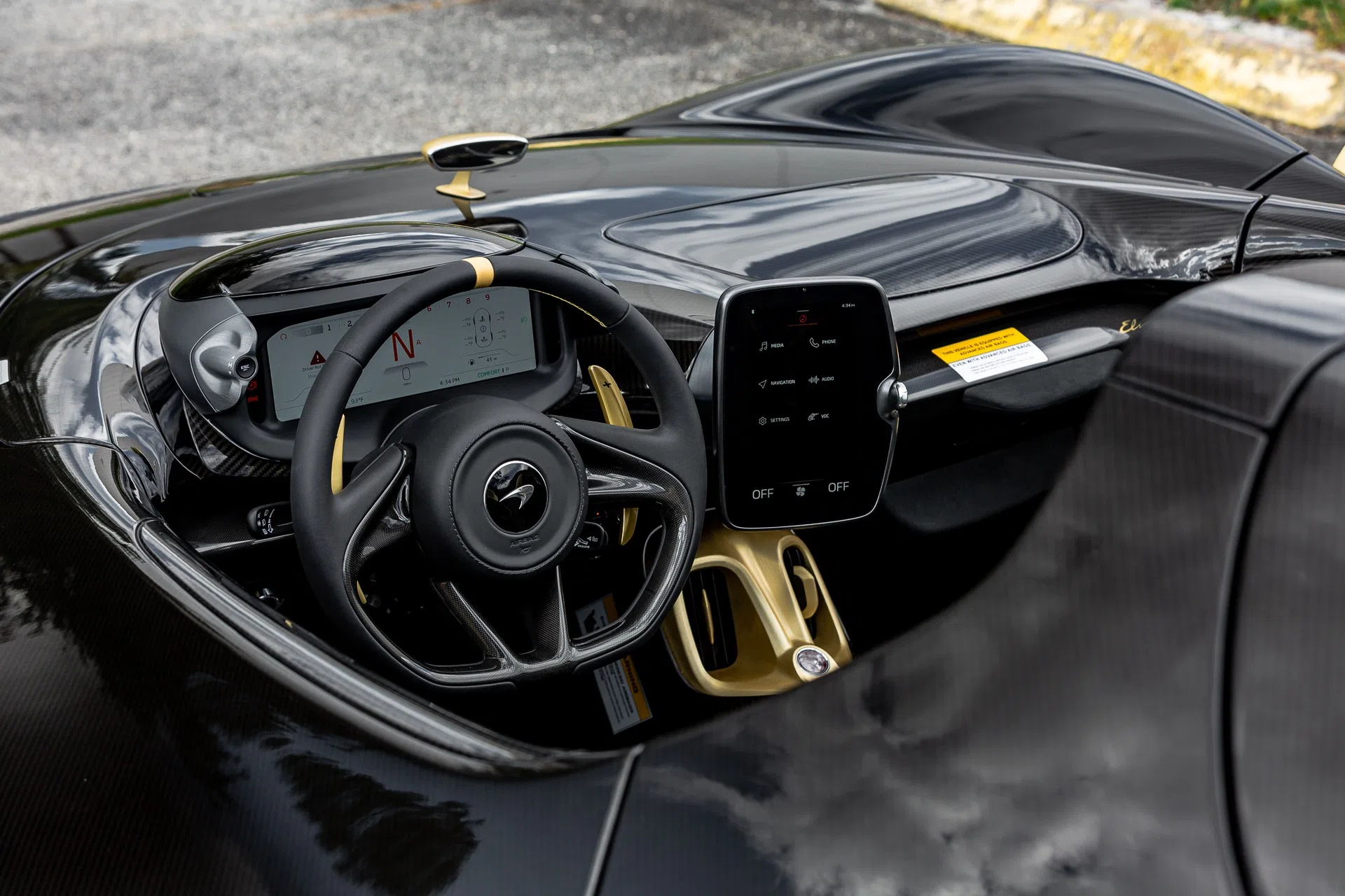 2021 McLaren Elva interior, dashboard, Gold Tinted Exposed Carbon Fiber