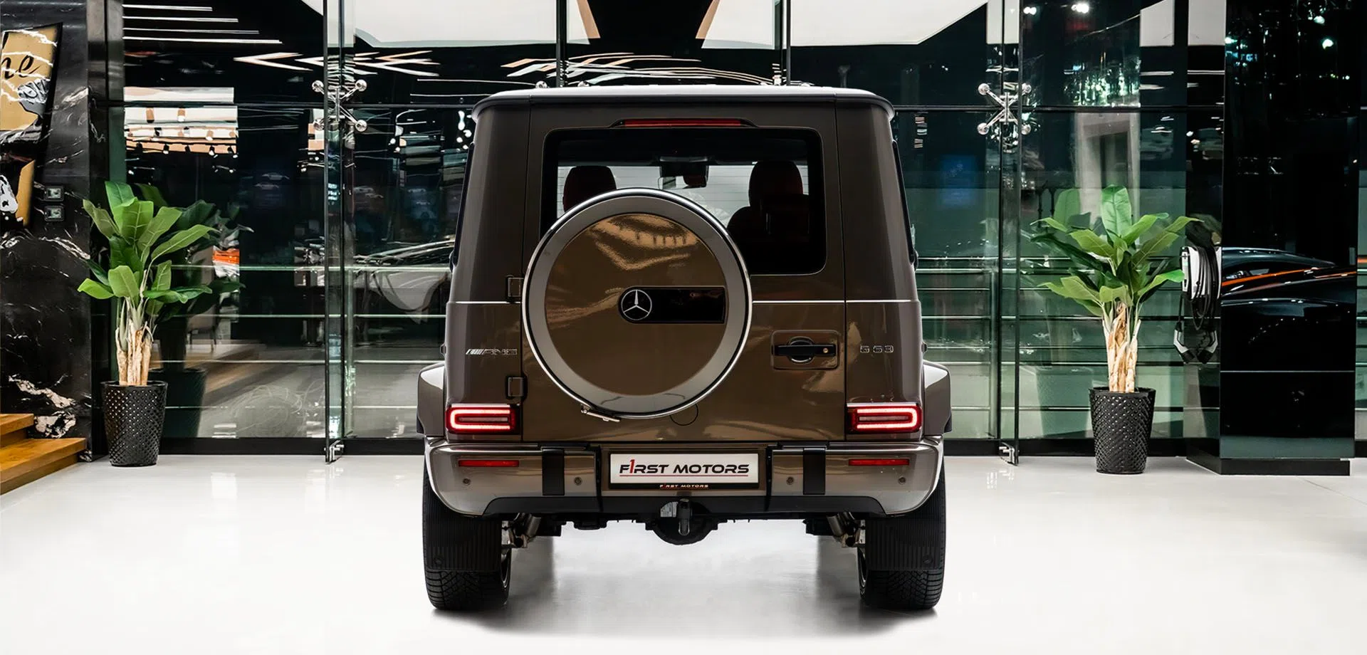 2021 Mercedes-AMG G 63, rear three-quarter view, Brown