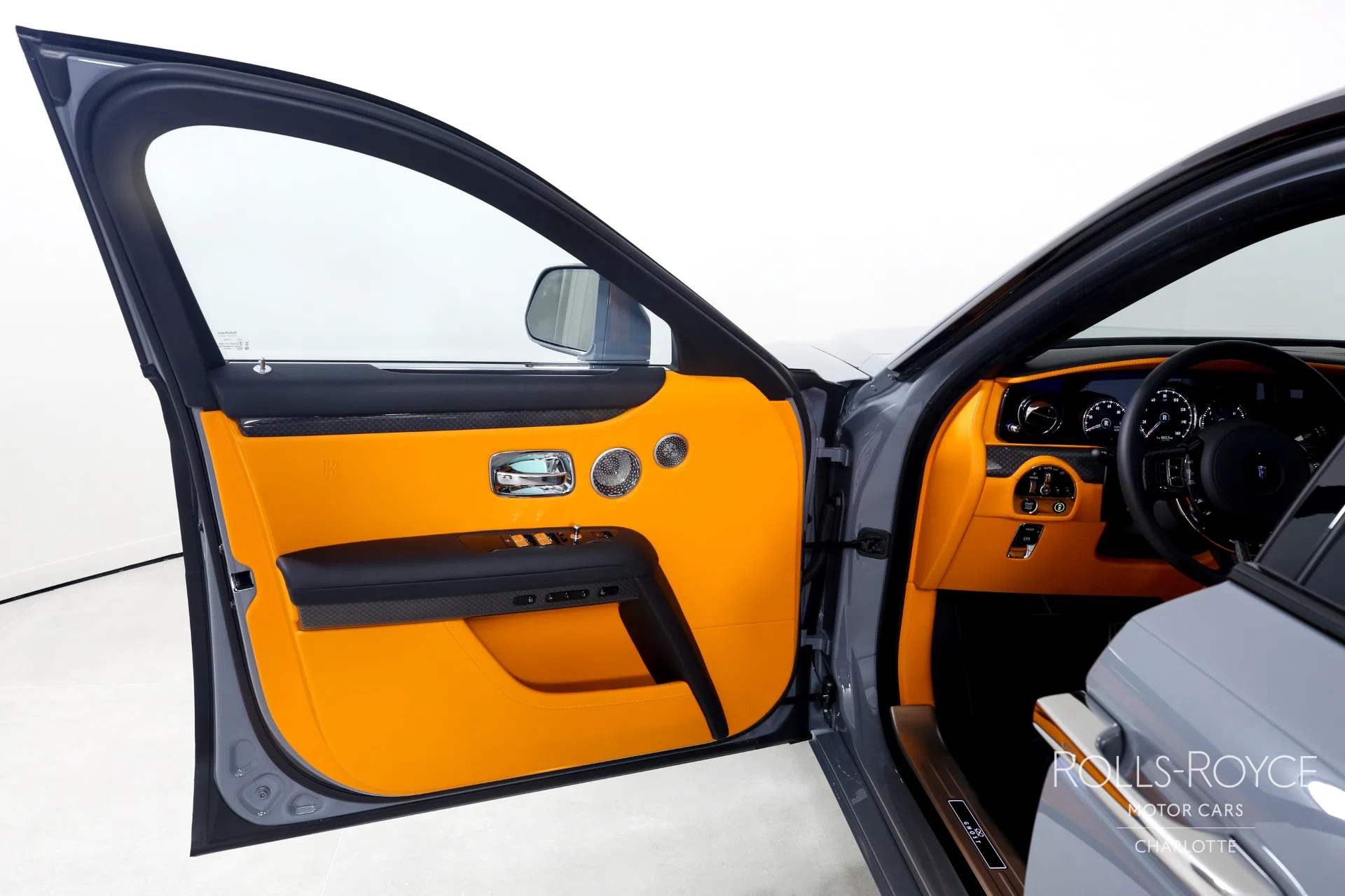 2022 Rolls-Royce Black Badge Ghost interior, door panel, Mandarin/Black