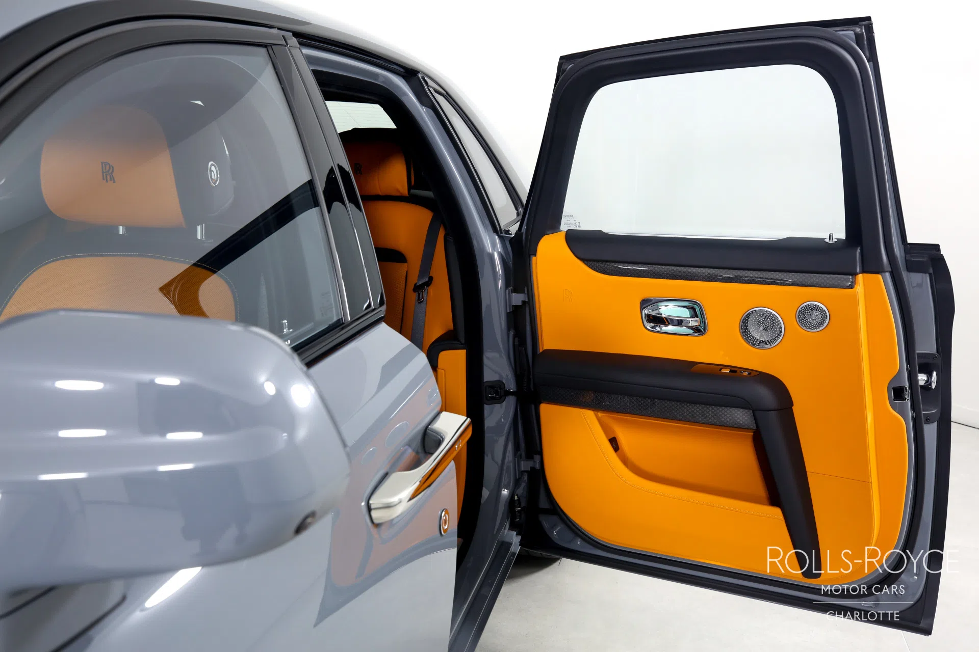 2022 Rolls-Royce Black Badge Ghost interior, door panel, Mandarin/Black