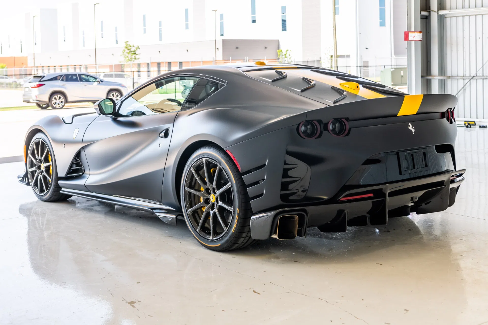2022 Ferrari 812 Competizione for sale, exterior, Matte Black w/ Yellow