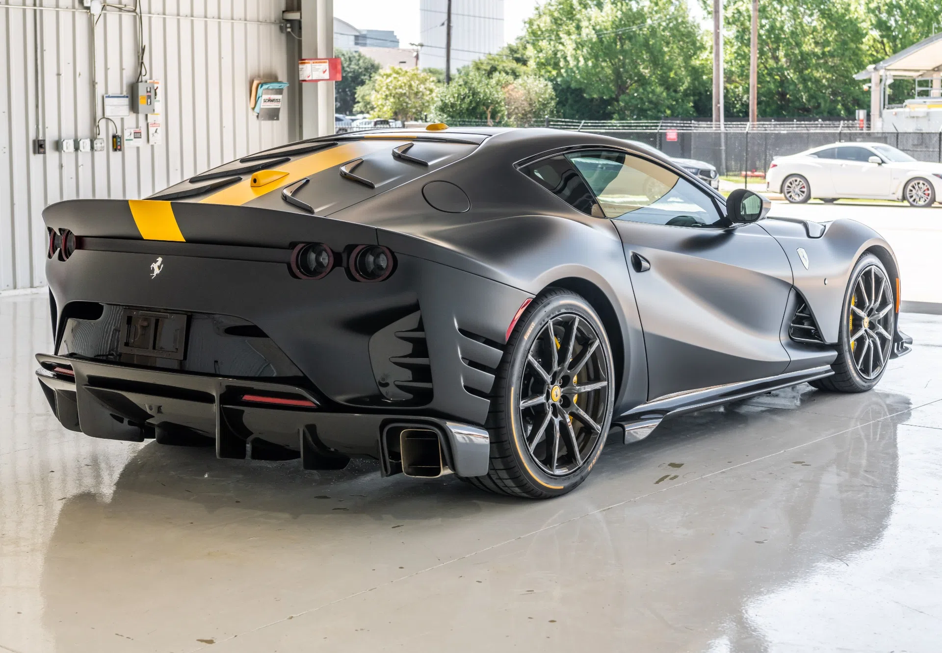 2022 Ferrari 812 Competizione for sale, exterior, Matte Black w/ Yellow