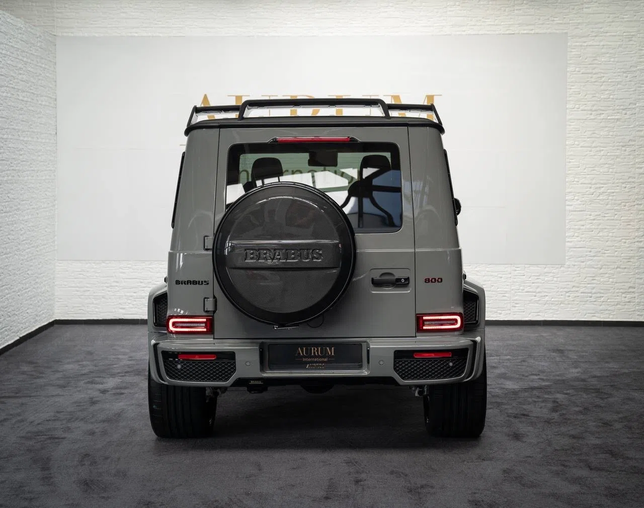 2023 BRABUS G 800 Widestar, rear three-quarter view, Classic Grau