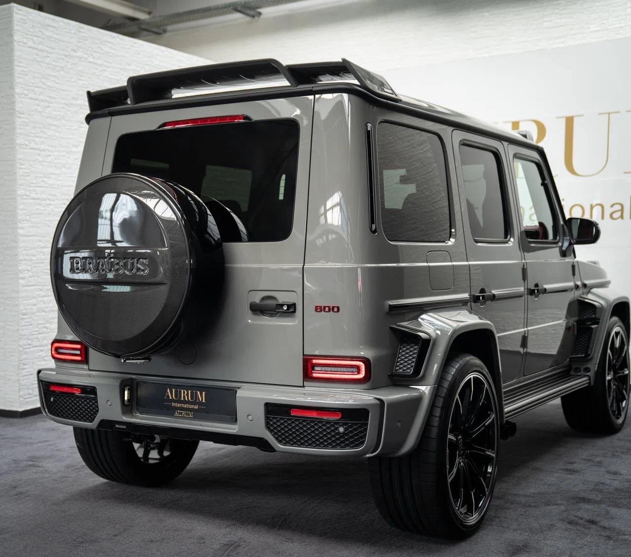 2023 BRABUS G 800 Widestar, rear three-quarter view, Classic Grau