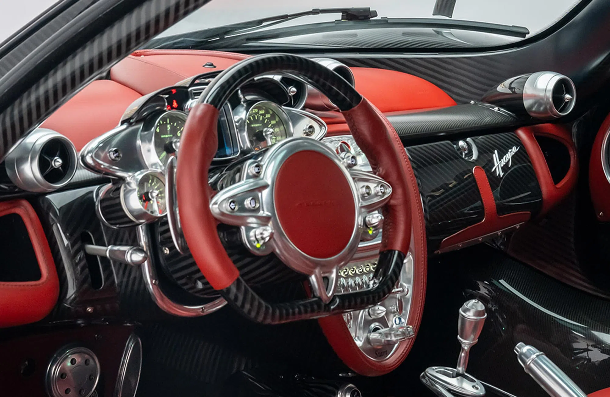 2014 Pagani Huayra Carbon Edition interior, dashboard, Hand-stitched red leather
