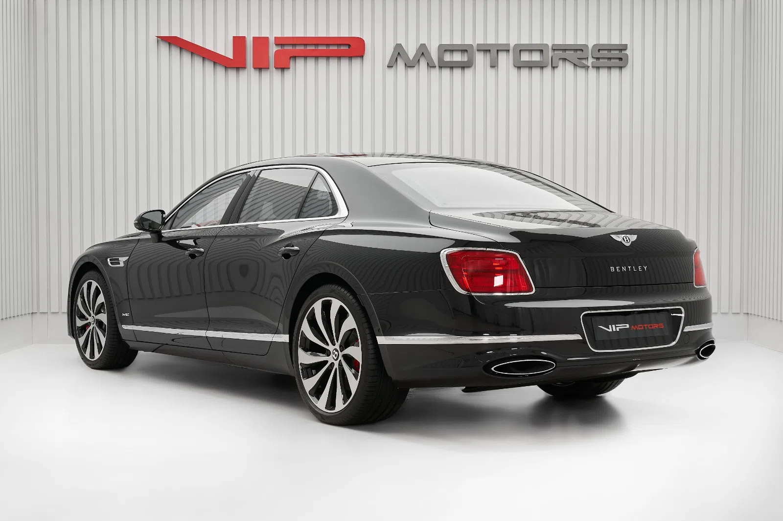 2022 Bentley Flying Spur, rear three-quarter view