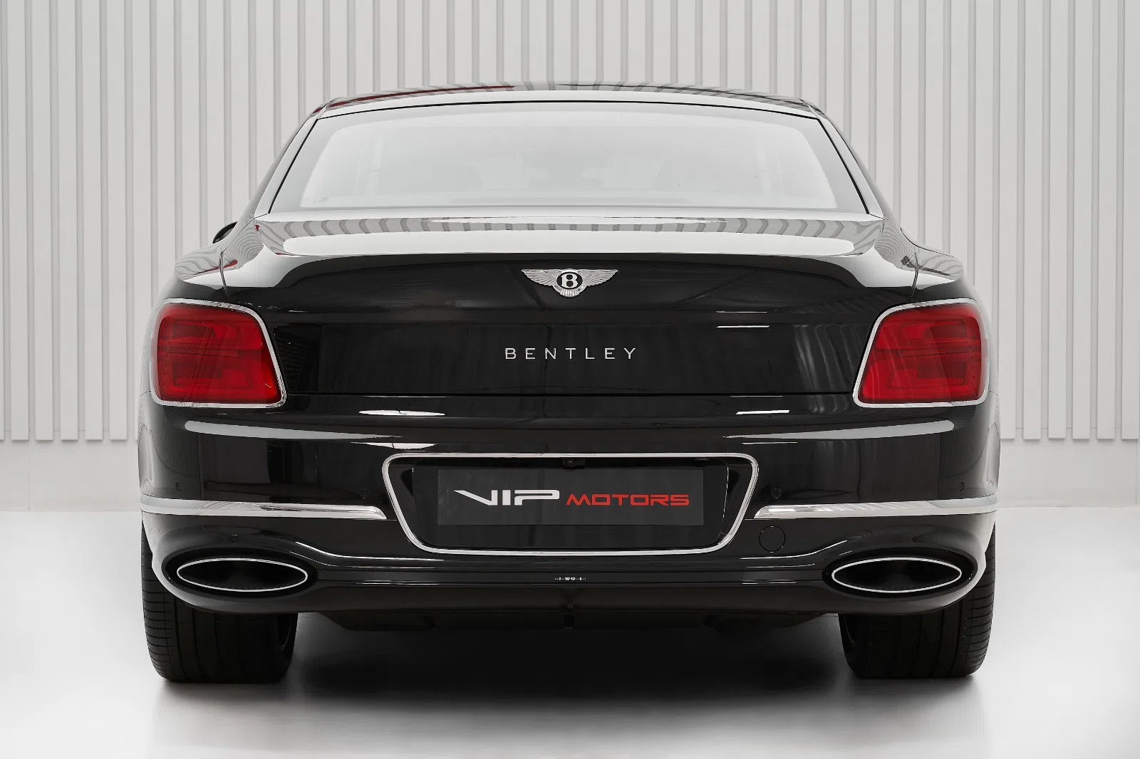 2022 Bentley Flying Spur, rear three-quarter view