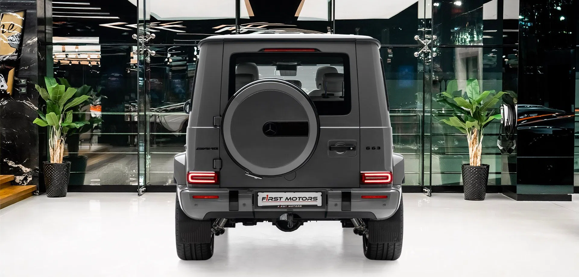 2023 Mercedes-AMG G 63, rear three-quarter view, Arabian Grey