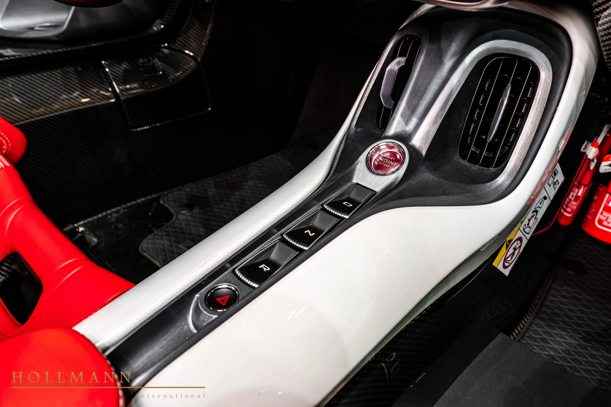 2023 McLaren Elva interior, center console, Leather Camine Red