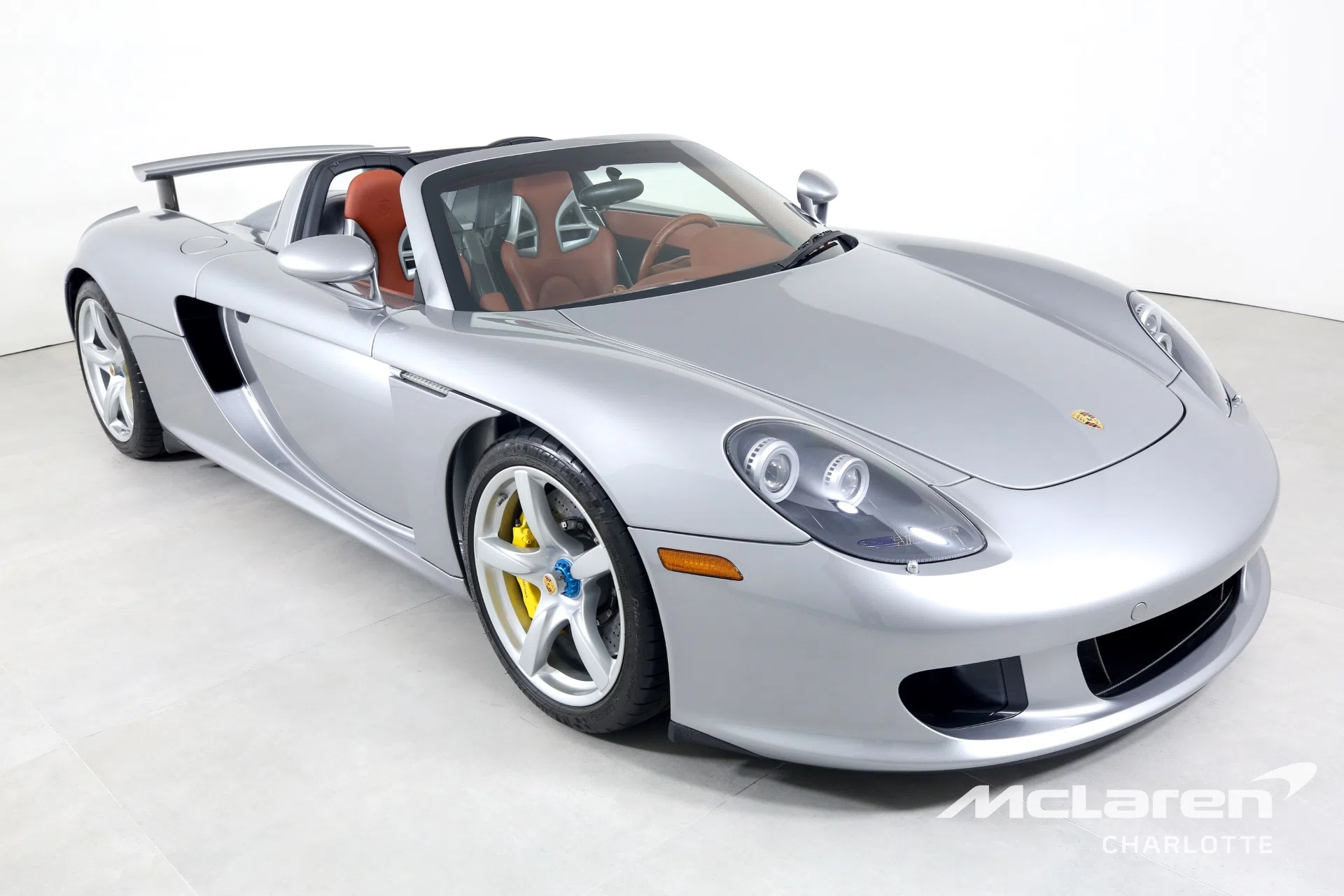 2004 Porsche CARRERA GT for sale, front three-quarter view, GT Silver Metallic