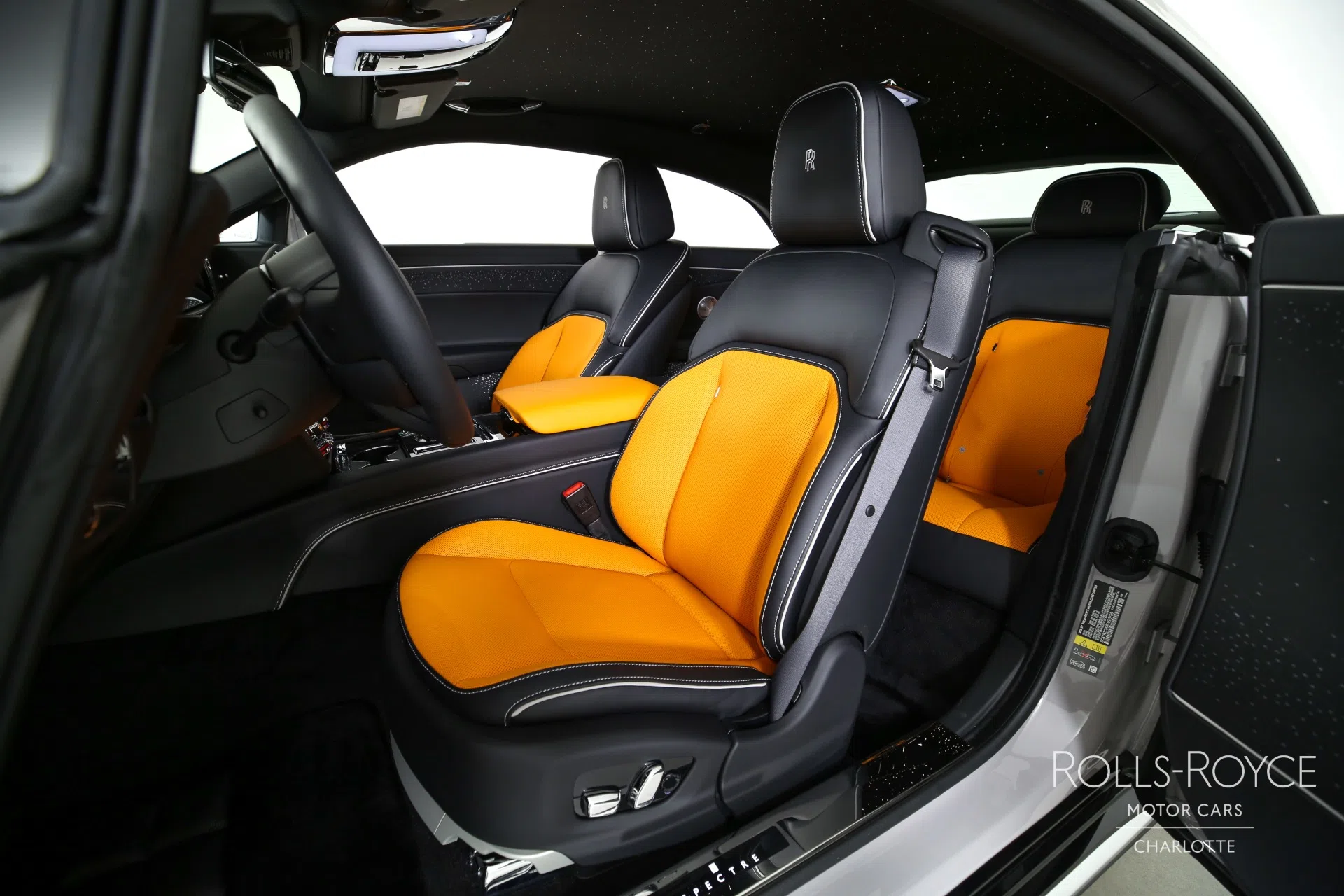 2024 Rolls-Royce Spectre interior, seats, Black/Mandarin/Cashmere Grey