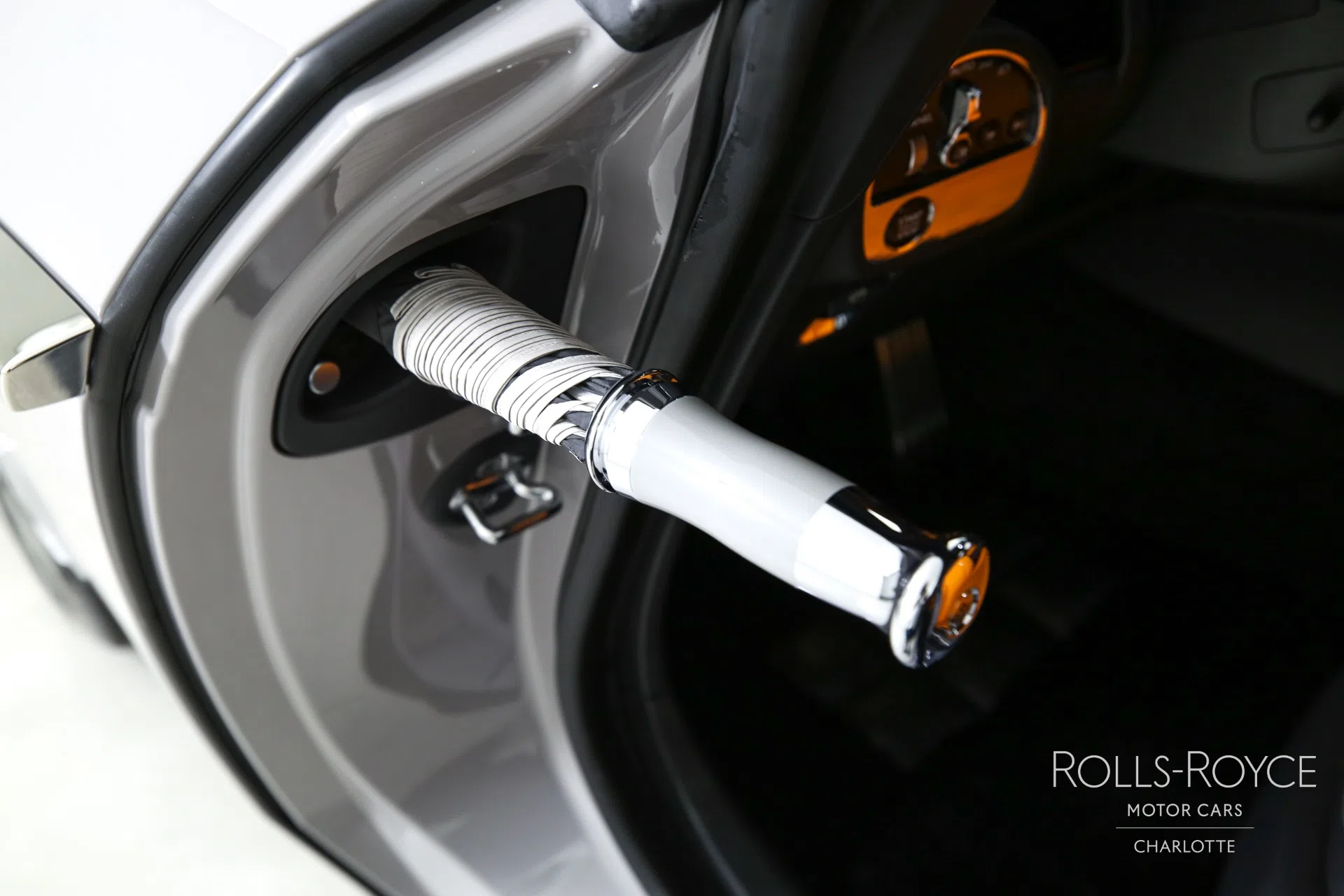 2024 Rolls-Royce Spectre interior, Black/Mandarin/Cashmere Grey